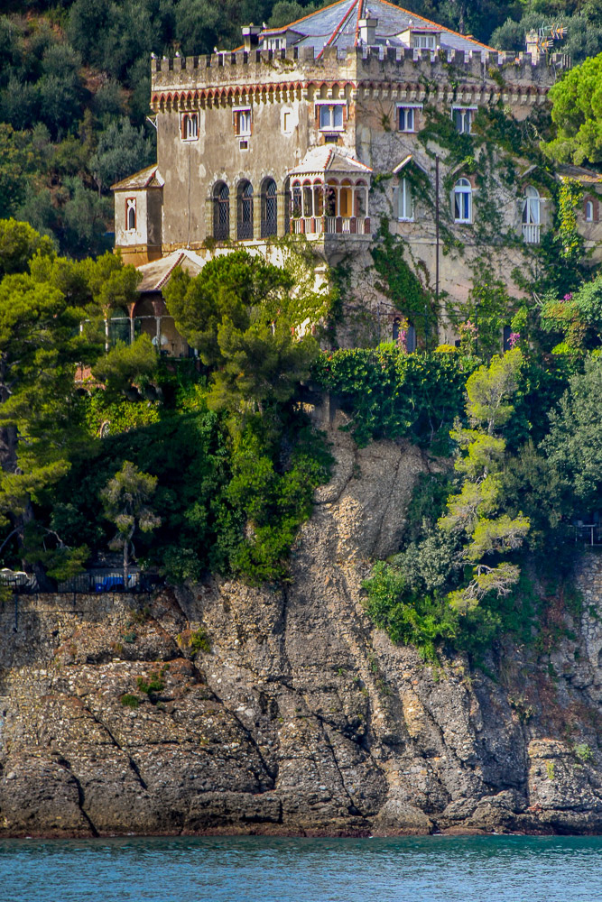 Grand Villas are perched precariously on the edge of cliffs.