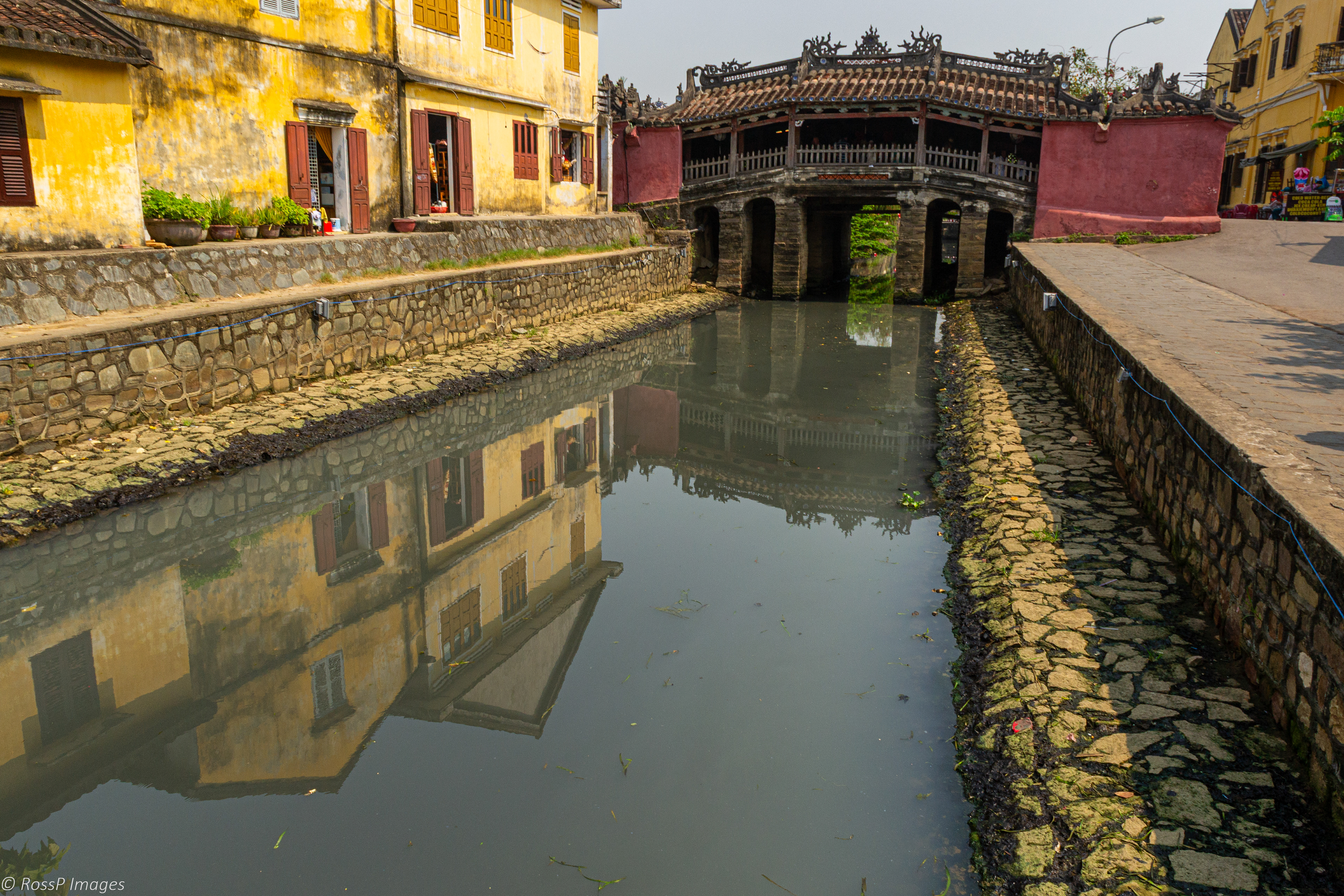 The Japanese Bridge (Chua Cau) built over a canal entering the Thu Bon river. The bridge was initially built by Japanese merchants in the late 16th century.