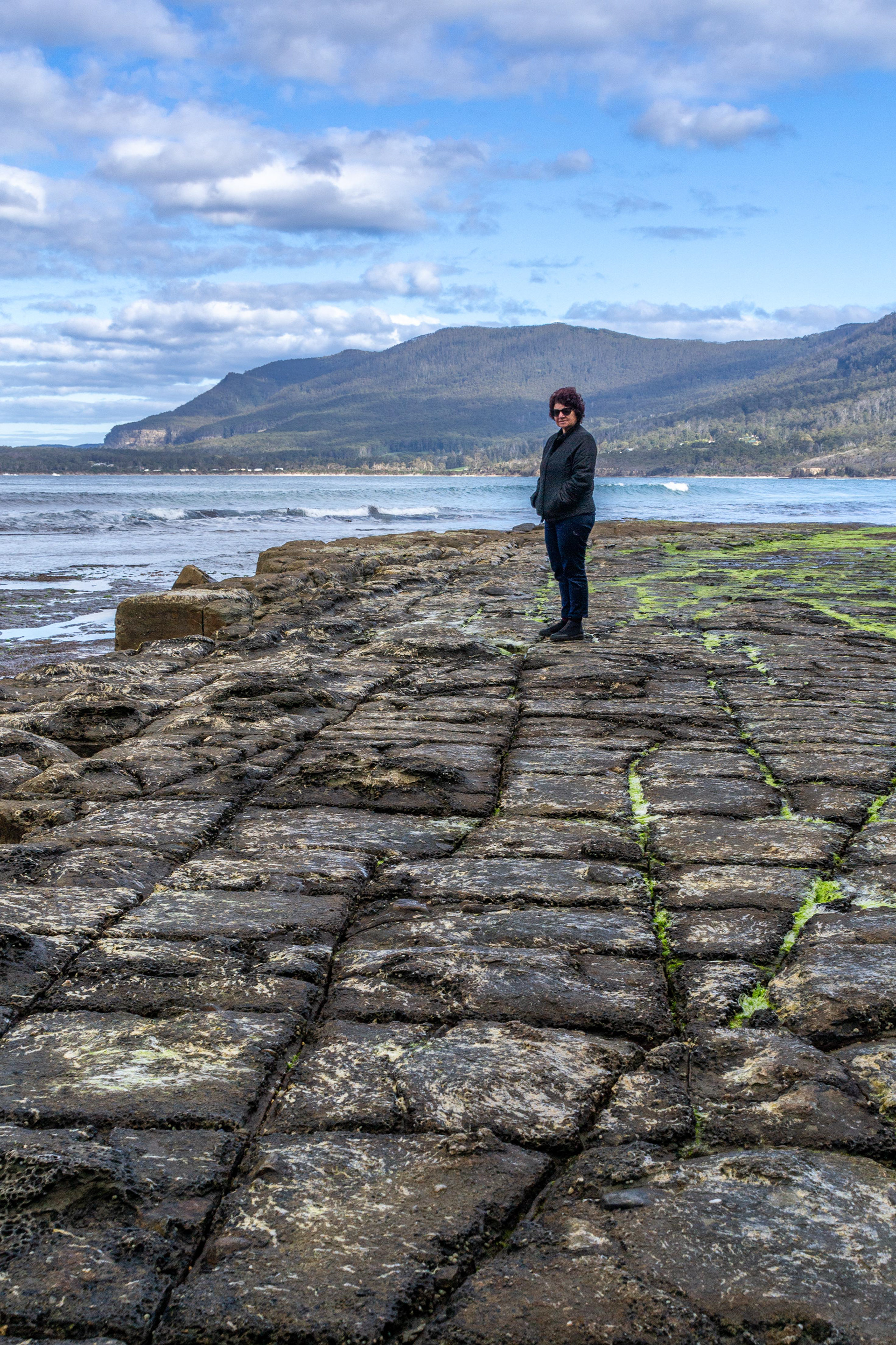 Cheryl exploers the tessellated pavement.
