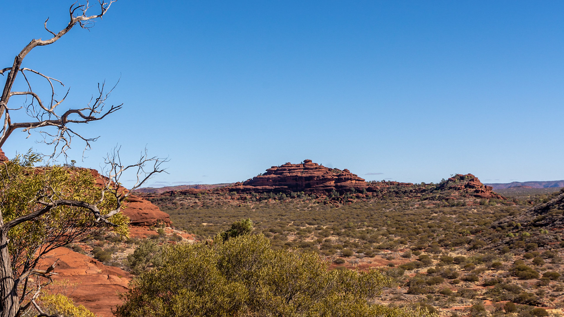 "Battleship" Ridge is an imposing sight against the clear sky - view from Kalarranga Lookout