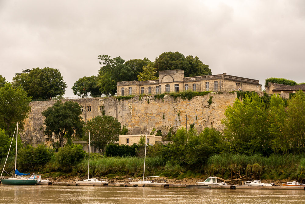 The citadel castle, with its horse-drawn carriage museum "Au temps des calèches", French formal gardens and terrace overlooks the lower town and river.