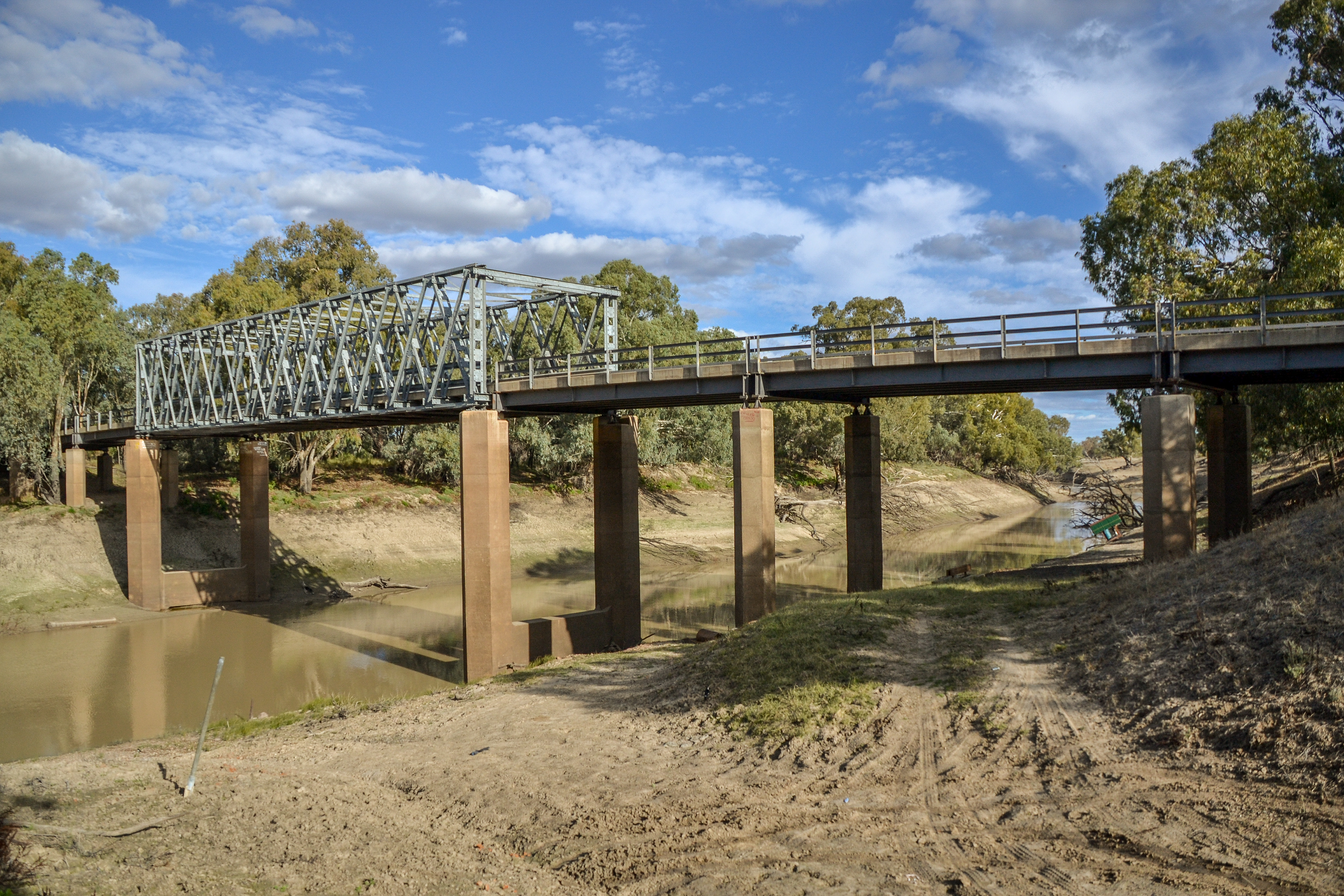 The Darling River is just a narrow brown ribbon under the bridge to Tilpa.