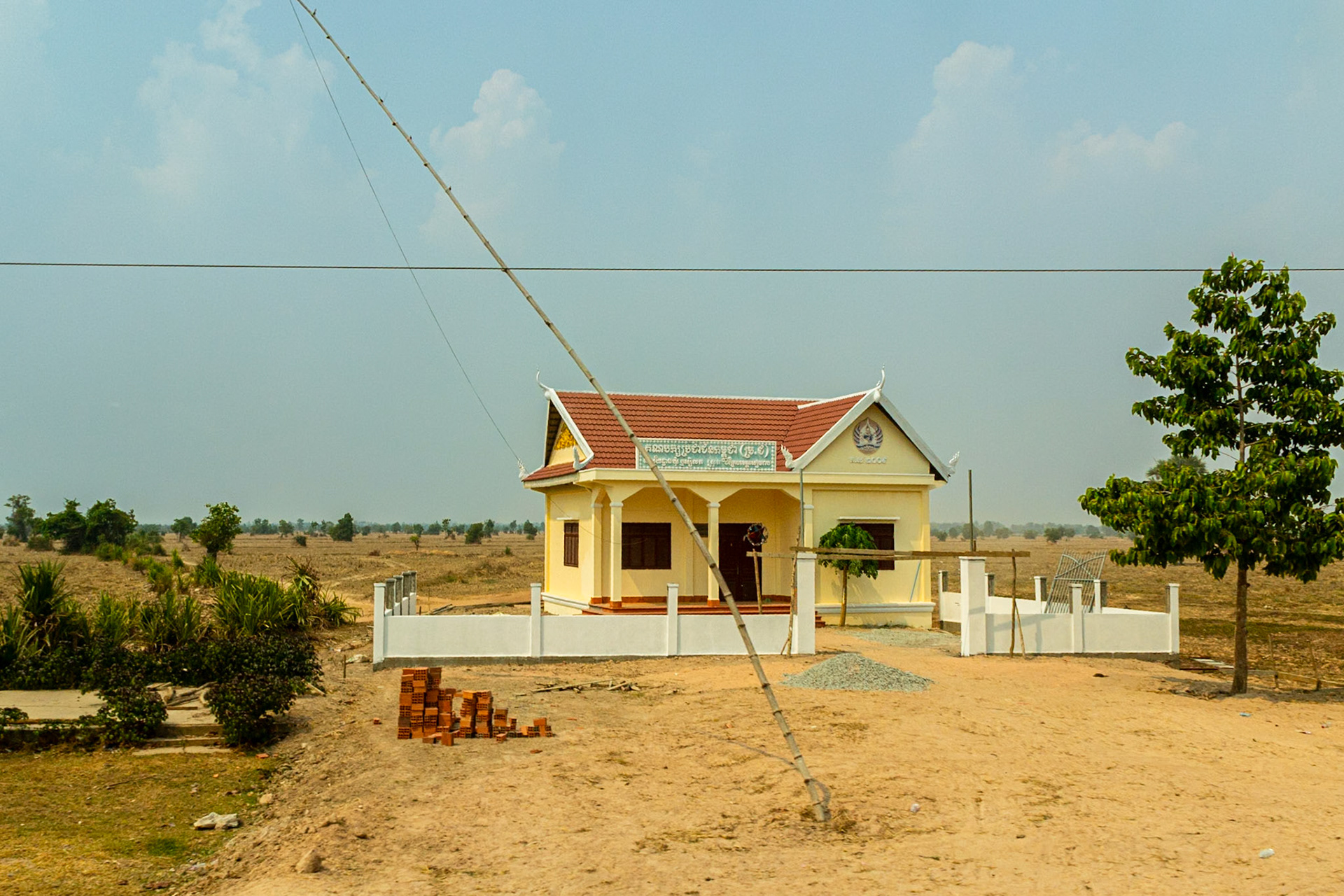 An official looking building in the middle of nowhere.