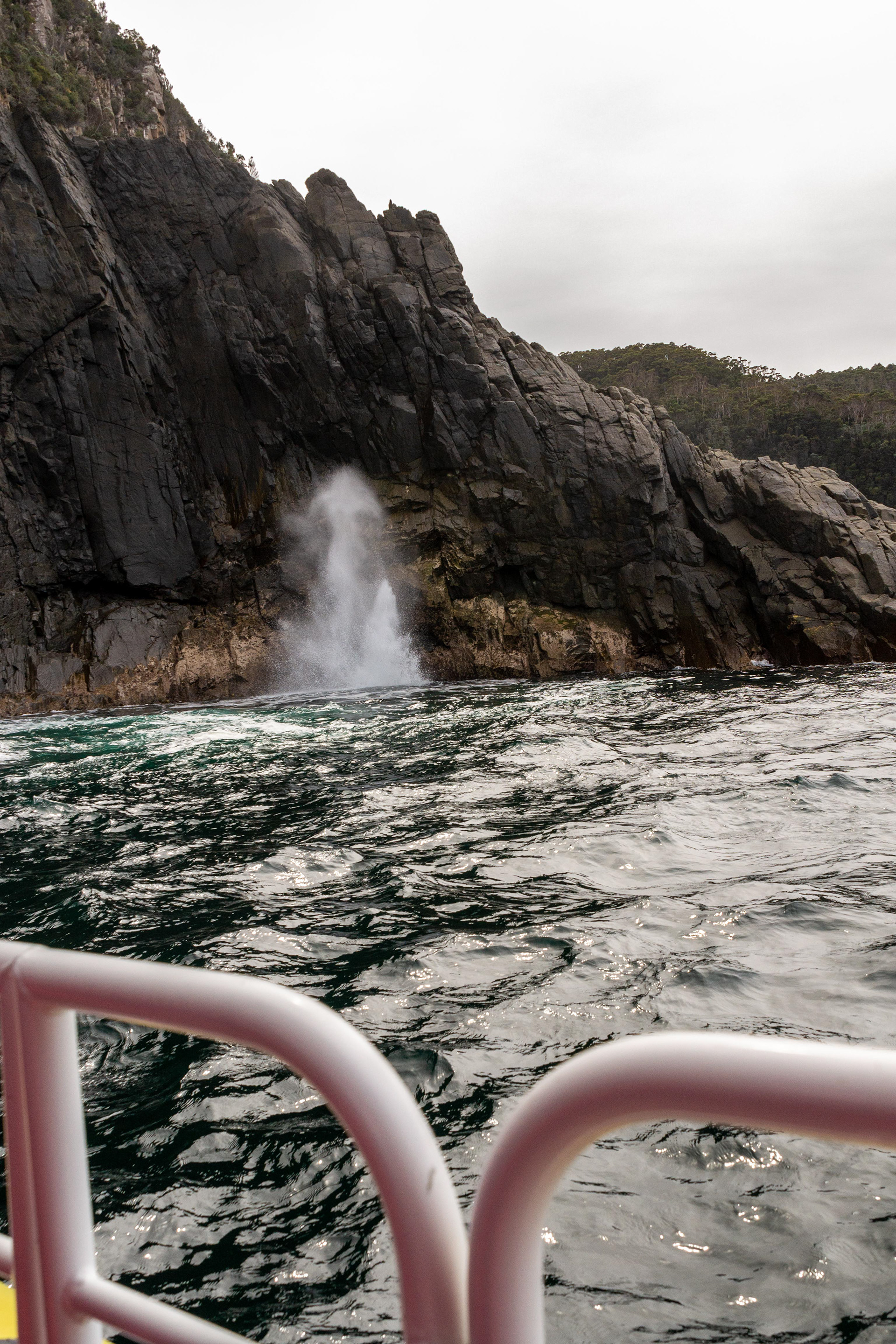 ....as air trapped in an underwater cave is compressed by the wave action...