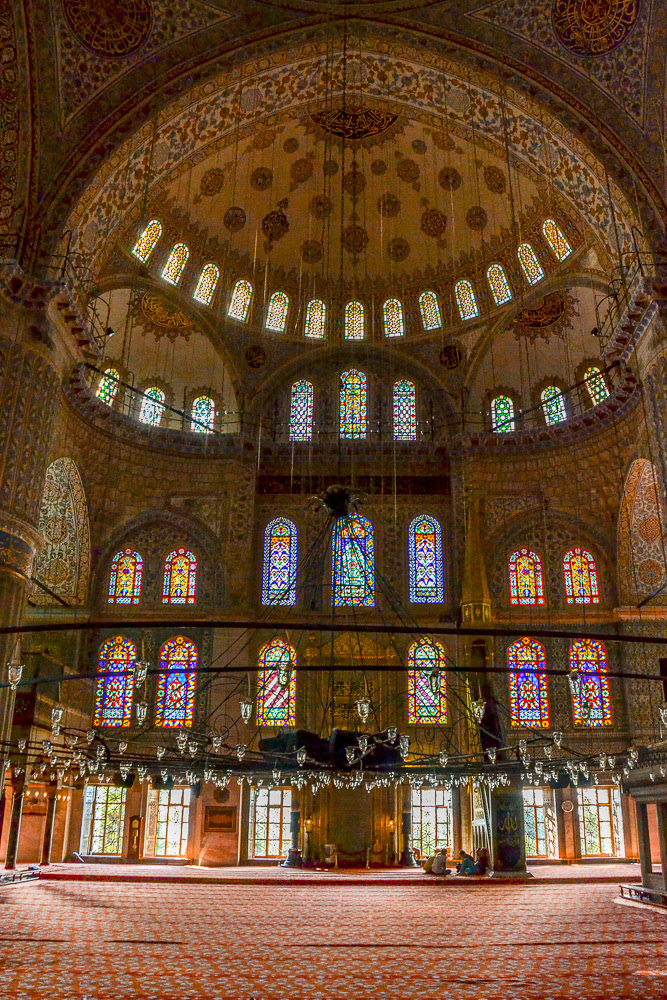 Sultan Ahmed Mosque continues to function as a mosque today; men still kneel in prayer on the mosque's lush red carpet after the call to prayer.