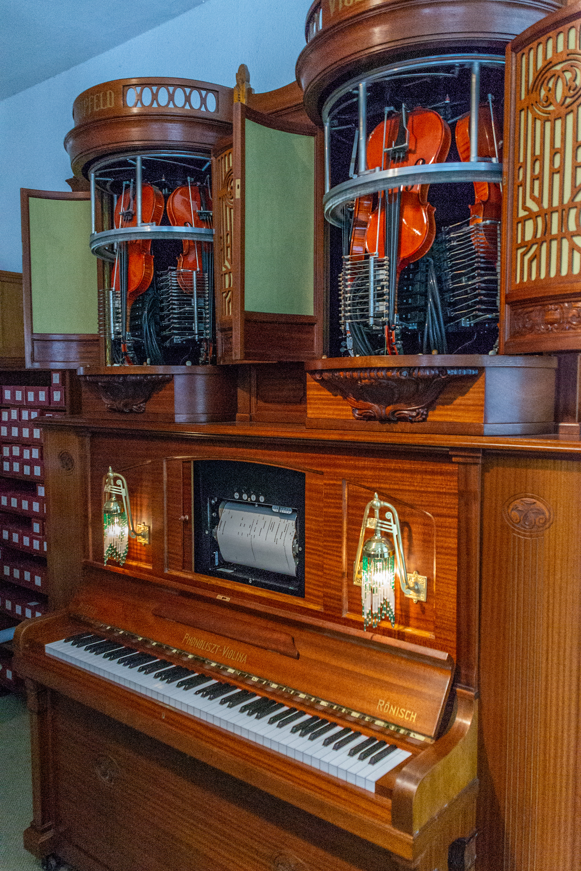 An Orchestral Calliope with perforated paper music rolls.