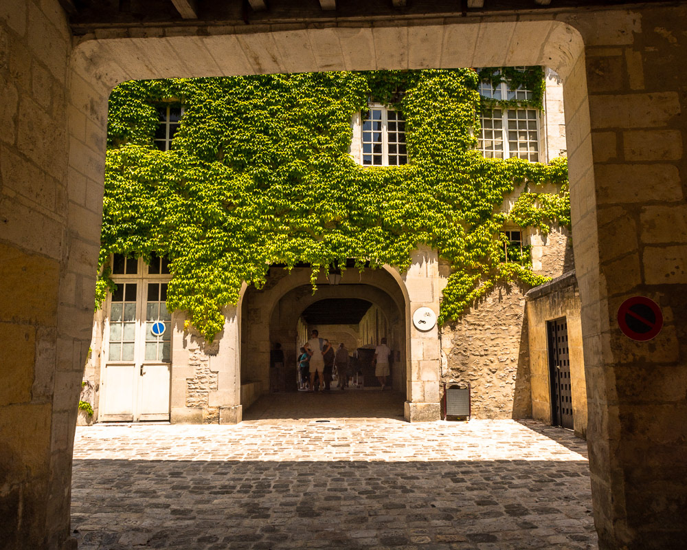 Ivy covered ardhways leading into the Priory of Saint Leger Cloisters.
