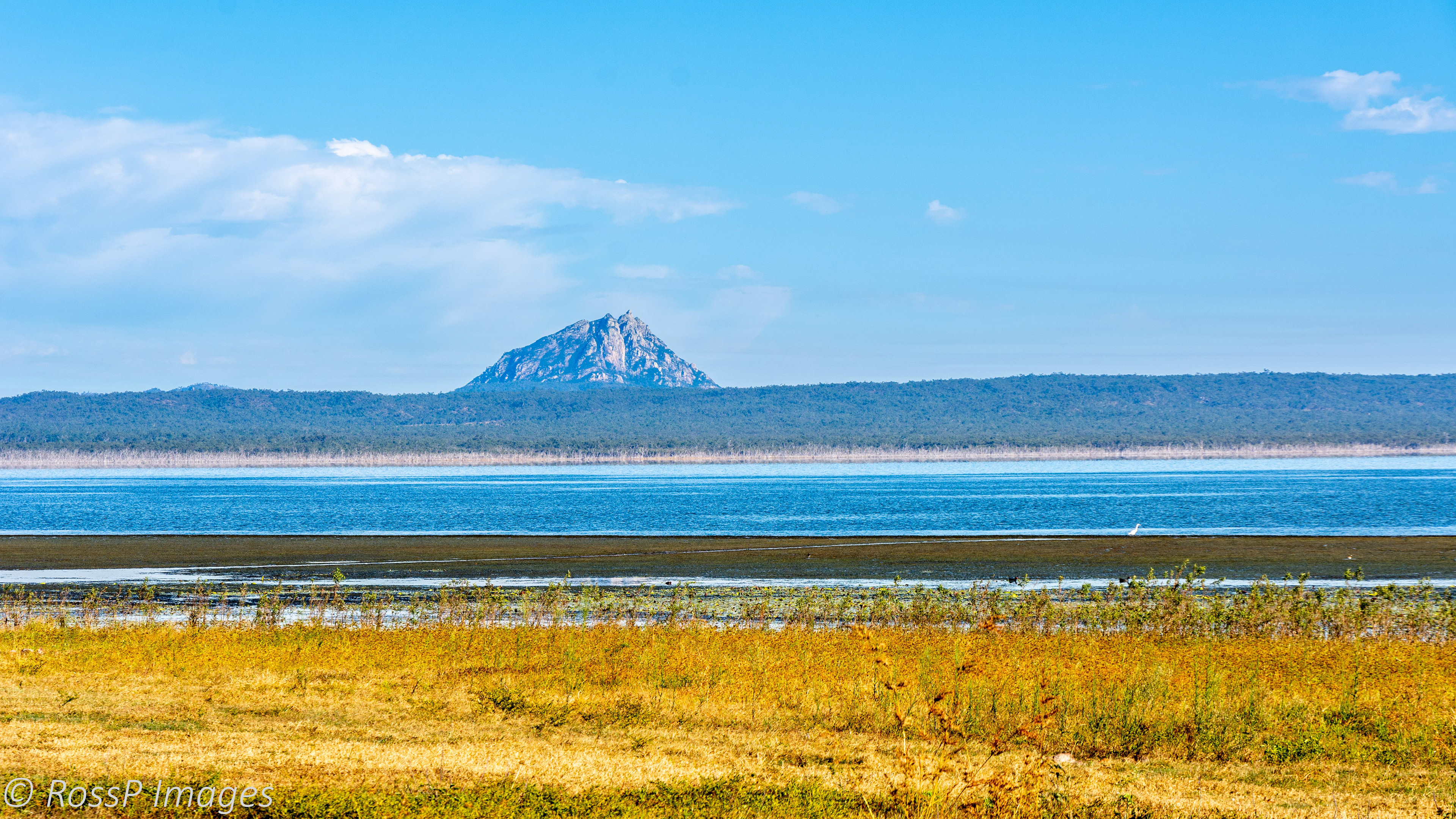 Looking west across Lake Proserpine to a weathered volcanic plug.