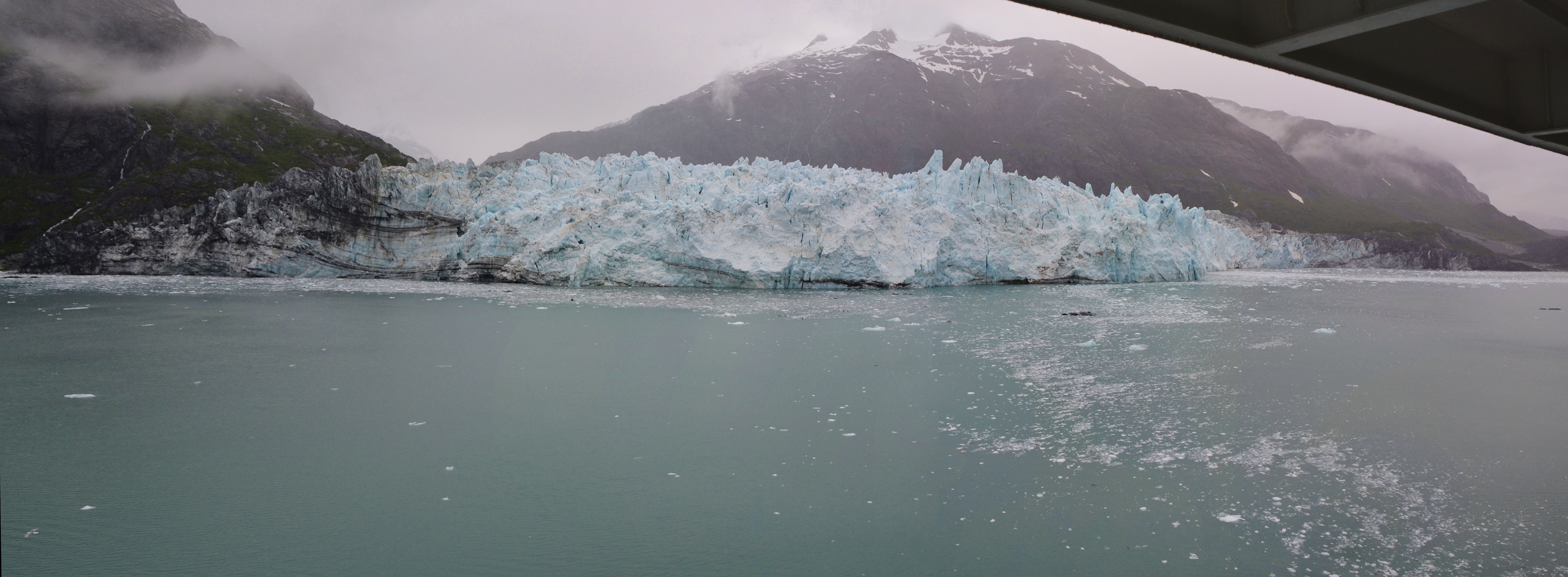 Located at the deep end of the Glacier Bay, Margerie Glacier has a width of about 1.6 km as it enters the inlet and extends upstream for a length of 34 km.