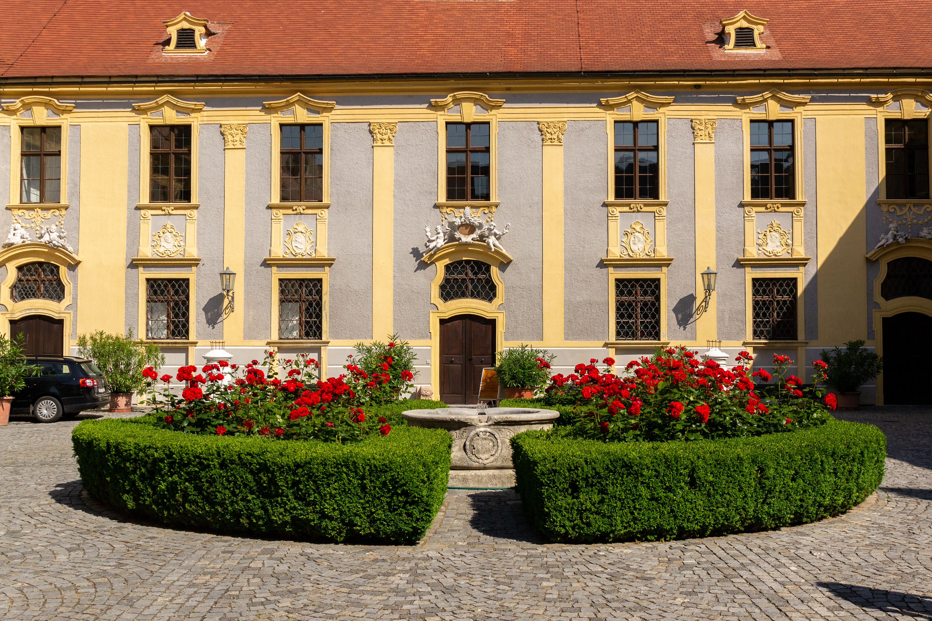 Manicured rose gardens nestle in the central courtyard of the Augustinian Convent.