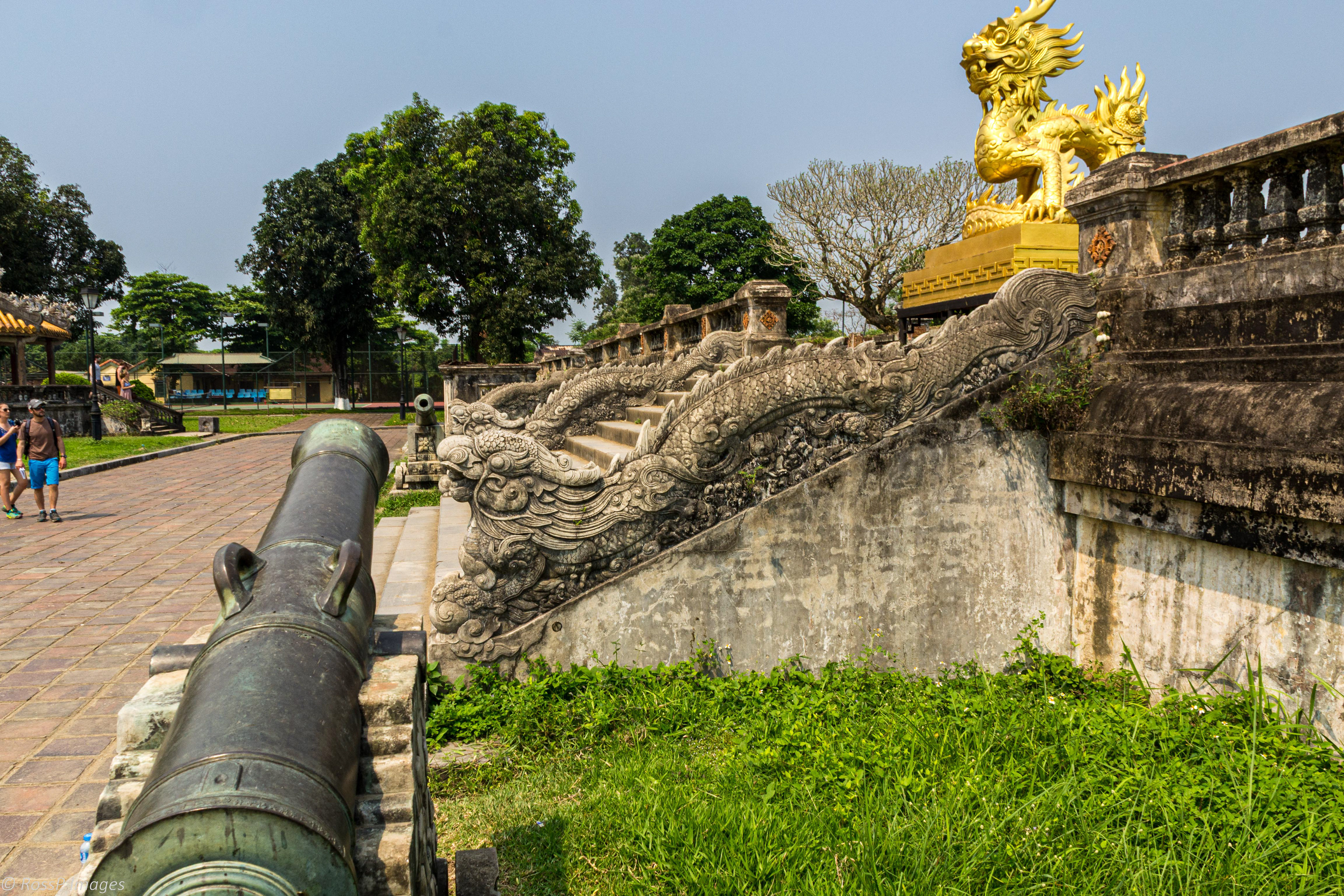A golden dragon sculpture stands on the terrace of the garden of the fobidden city just behind the Supreme Palace of Harmony.