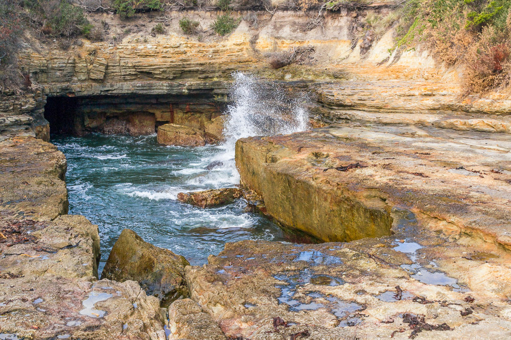 The Tasman Blowhole at Eagle Hawk Neck appears benign on a calm day.