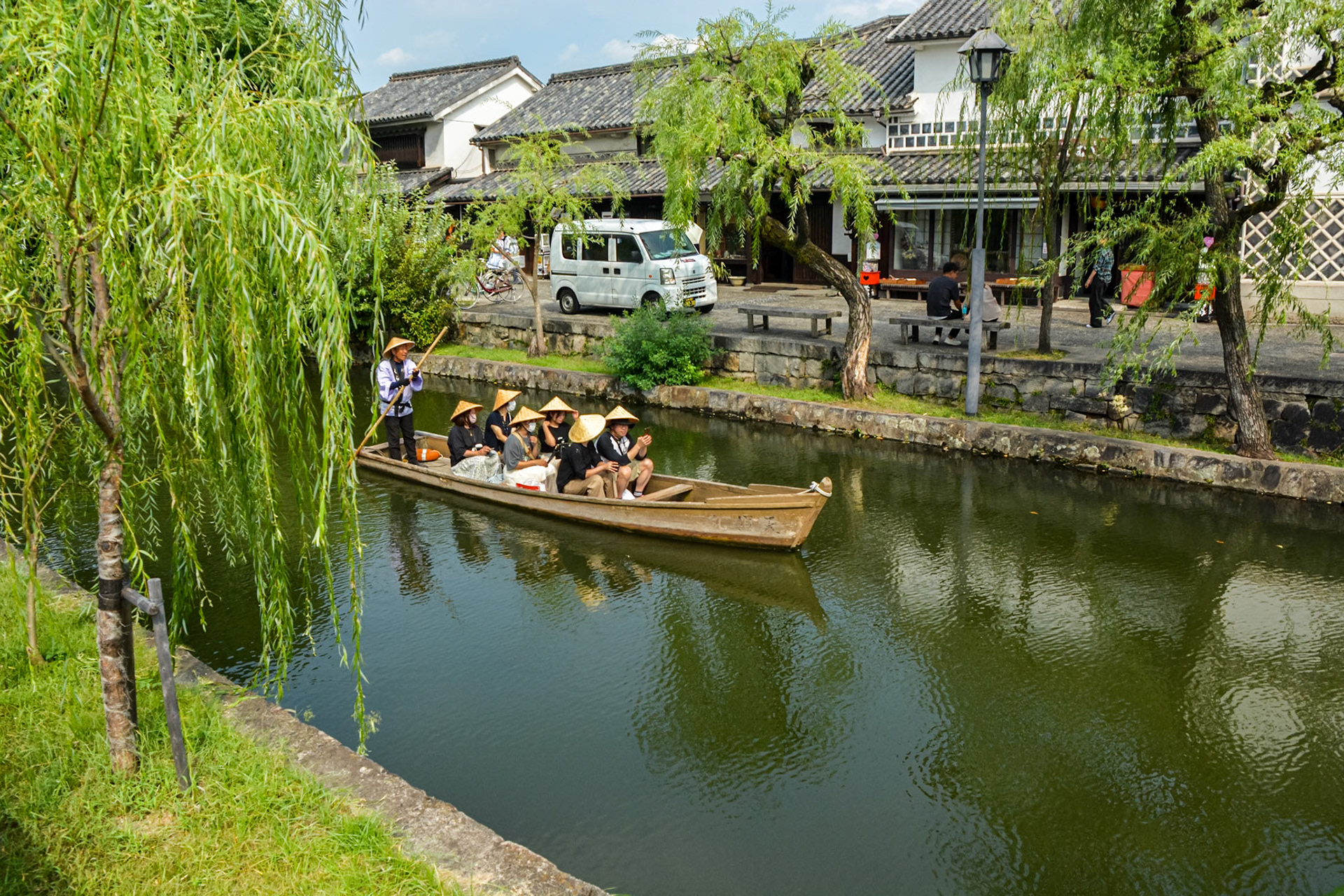 Canal boat rides in a traditional Japanese timber boat.