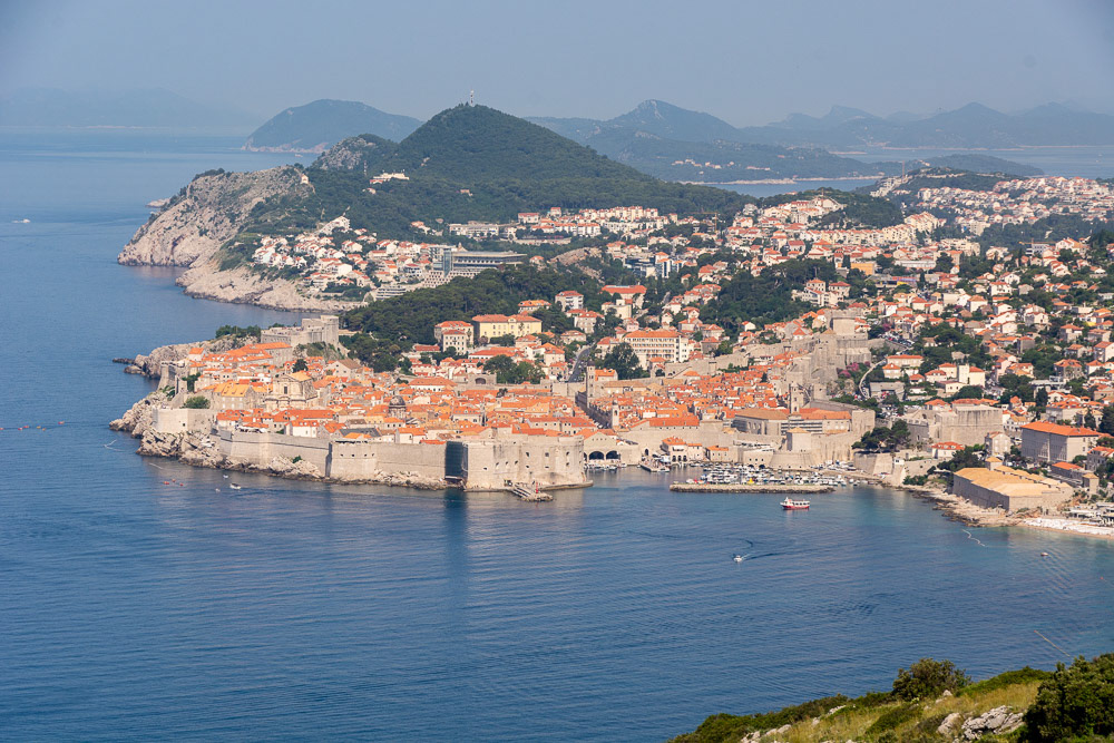 Terracotta roofs of the Old Town area are highlighted in the morning sun.