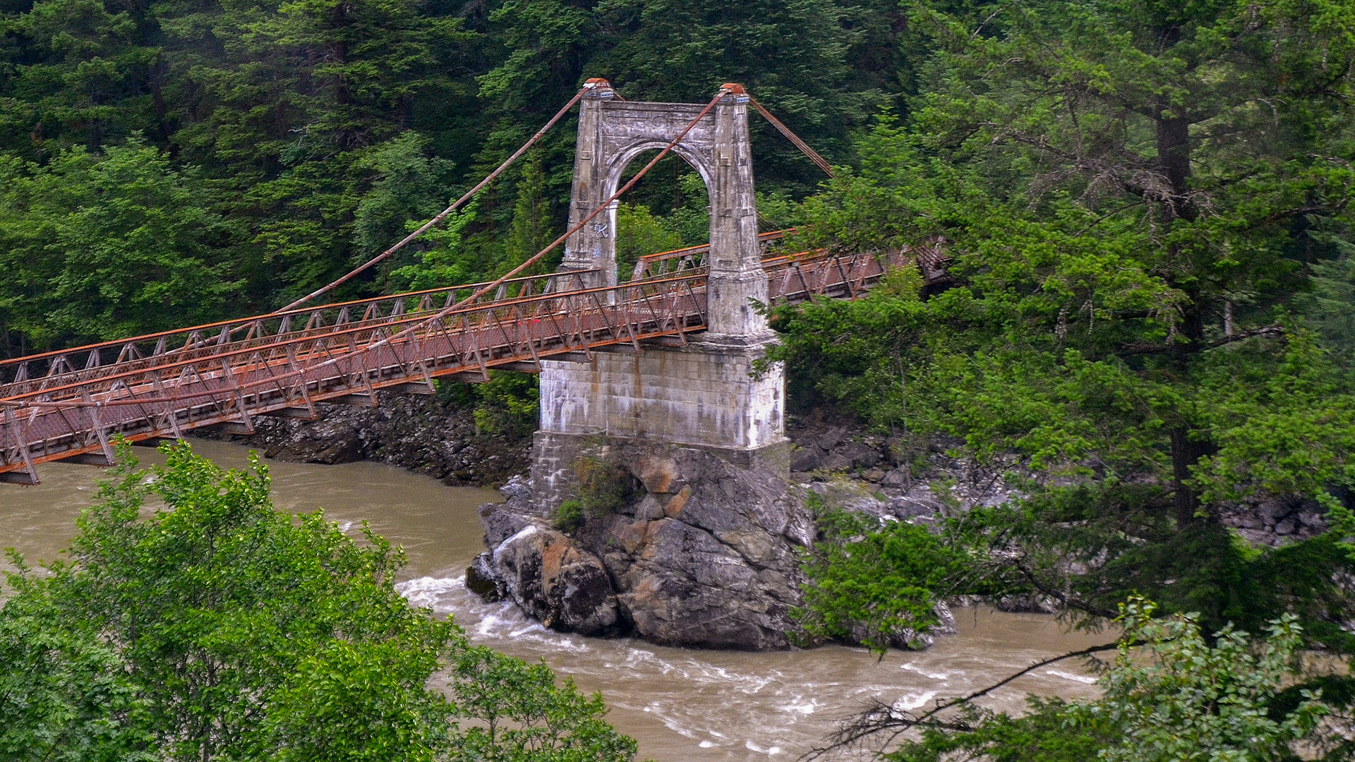 A historic suspension bridge across the Fraser River near Hell's Gate.