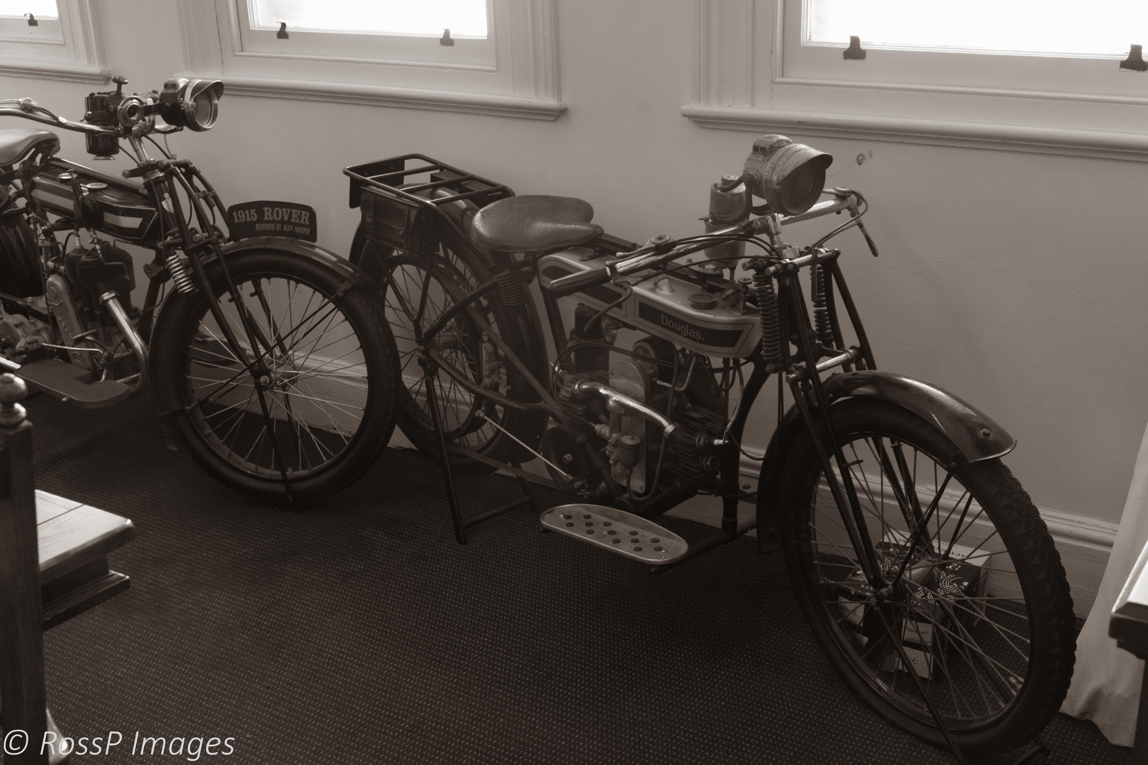 Fully restored and valuable, a 1915 Rover and 1907 Douglas Belt-drive Motorcycle has pride of place in the Railway Hotel's Dining Room.