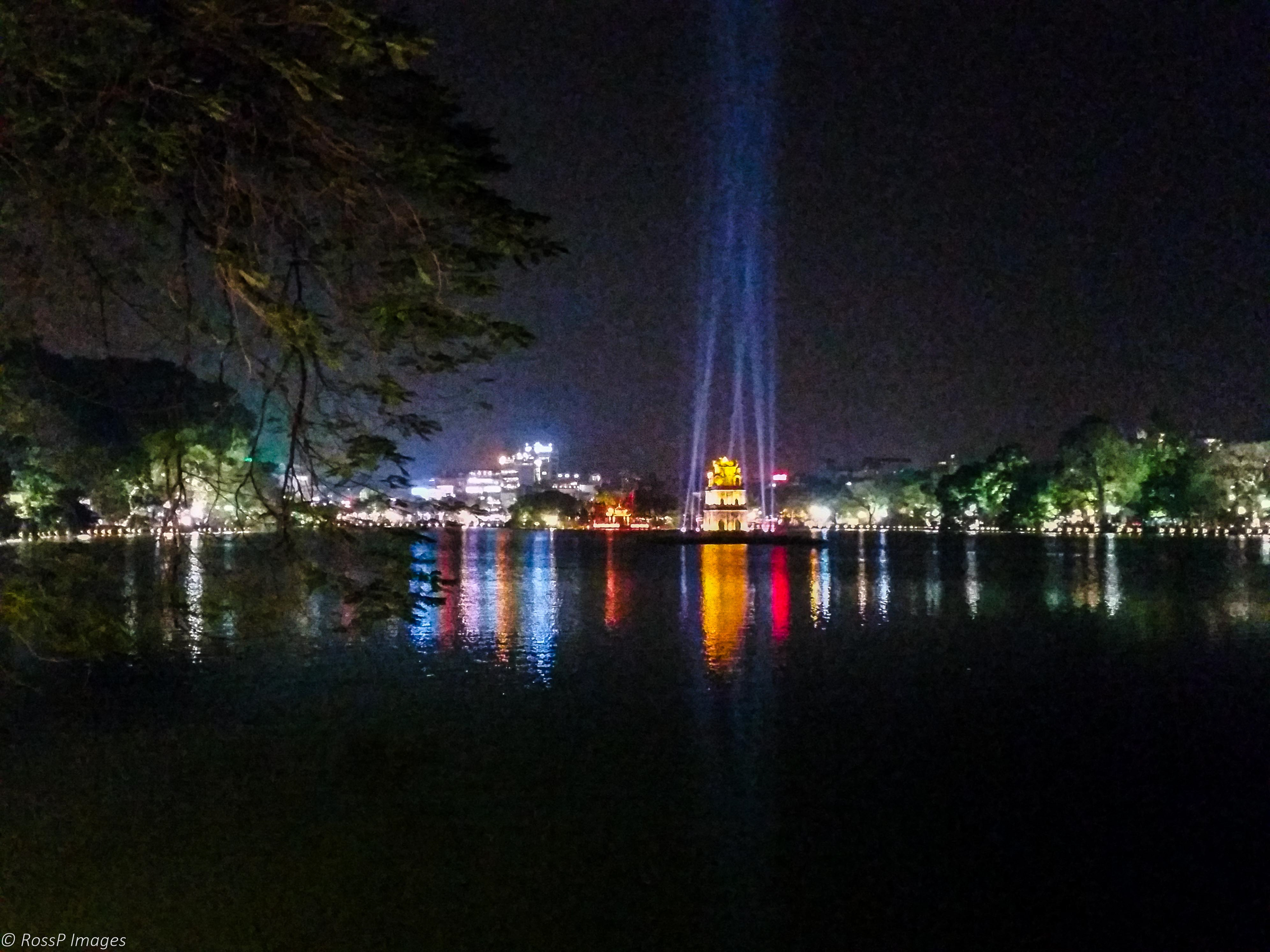 The Tortice Tower is lit up in Haon Kiem Lake.