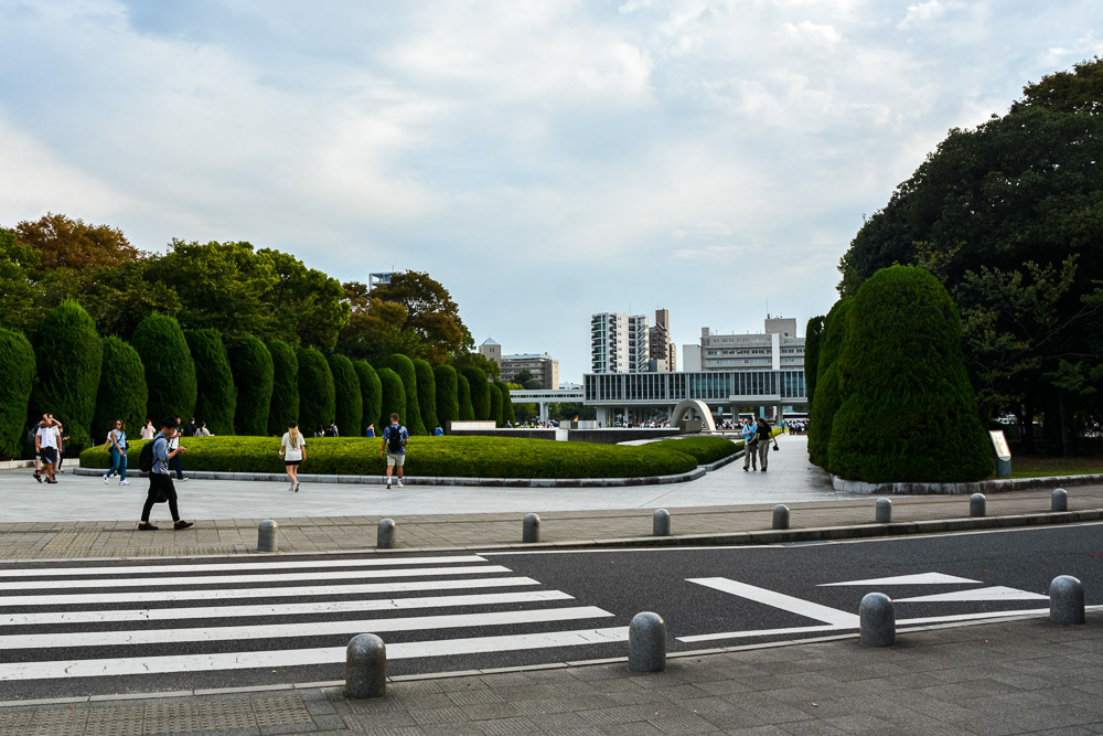 Looking toward The Memorial Cenotaph with the main building of Hiroshima Peace Memorial Museum at the rear.