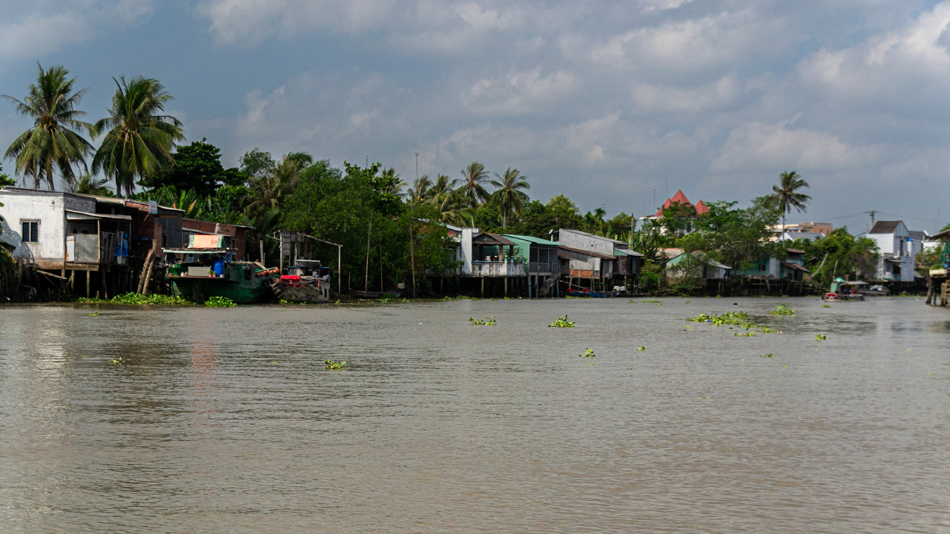 The high tide in Cai Be with amazing local house on stilts.