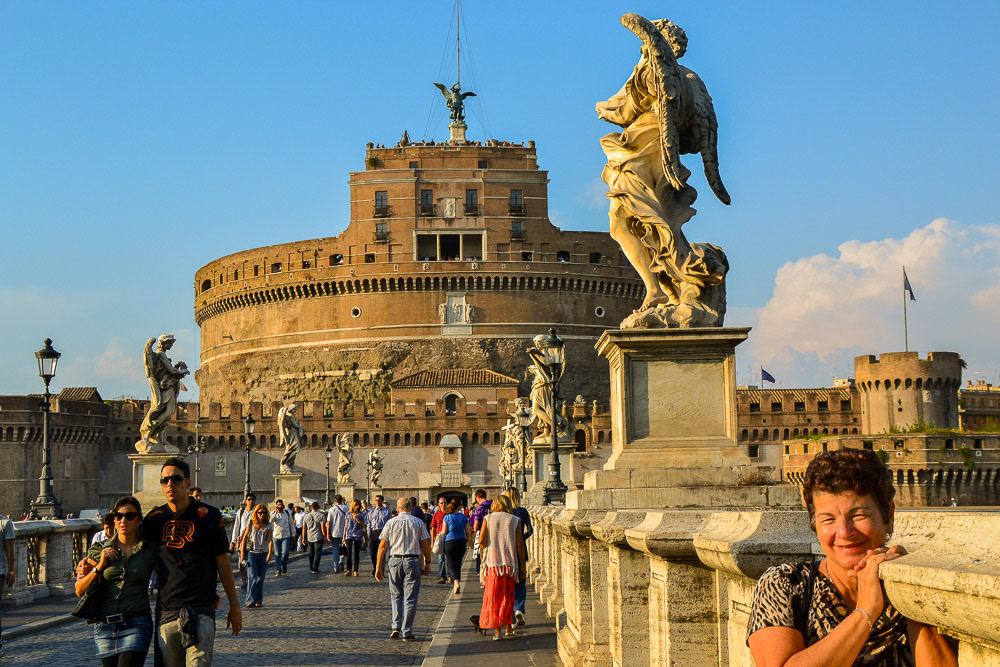 Castel Sant'Angelo from the bridge of the same name. The top statue is of Michael the Archangel.