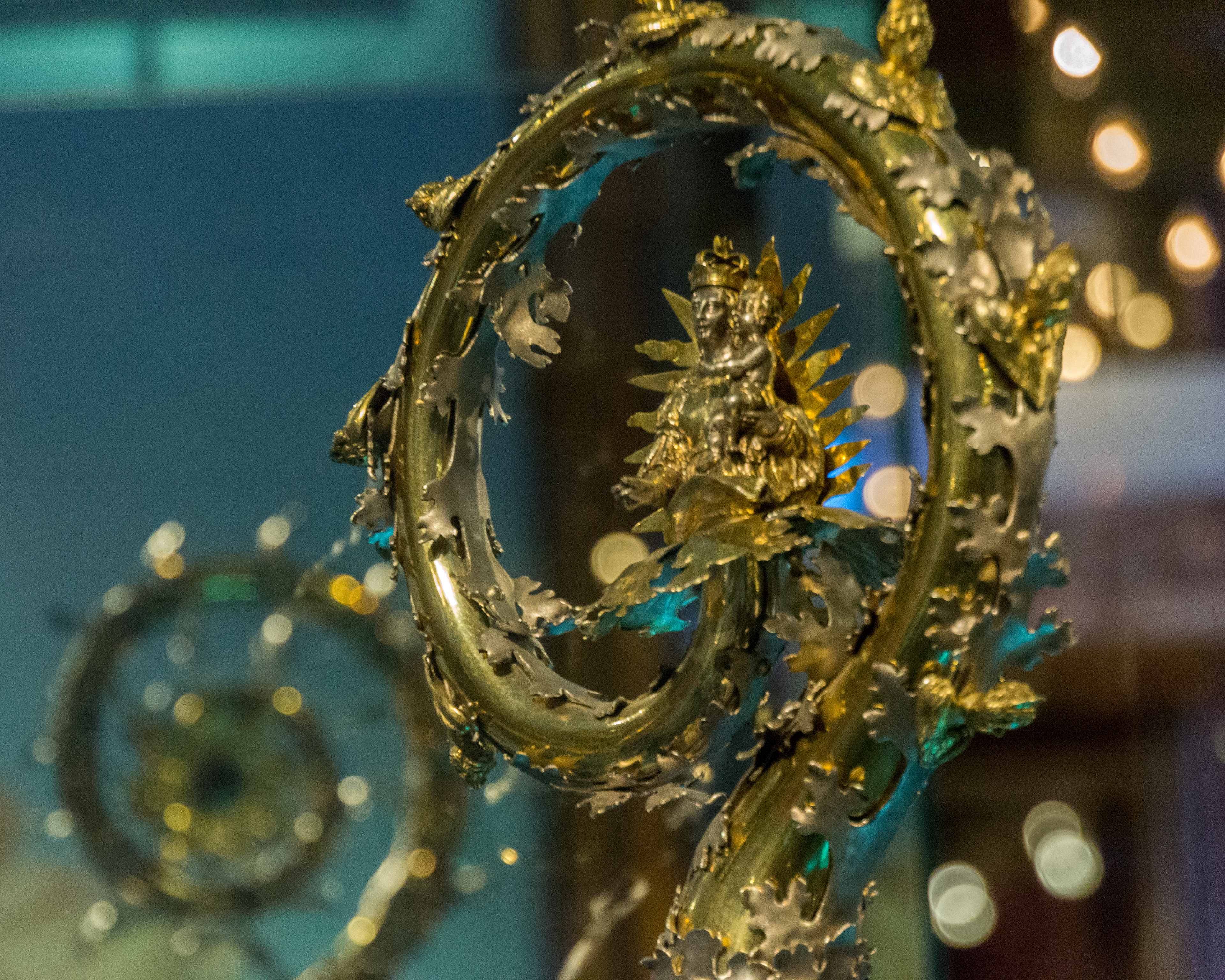 A golden Scepter with ornate decorations.