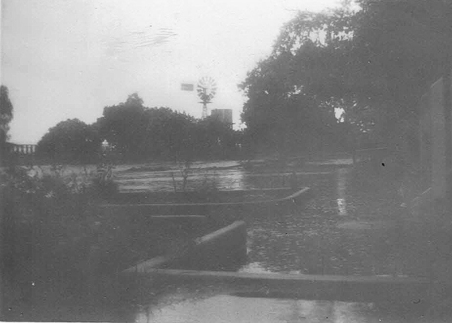 Floodwater inundated the gardens in front of the farmhouse.