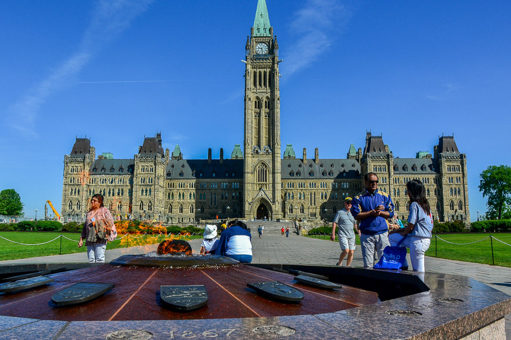 An eternal flame burns in front of Parliament House.