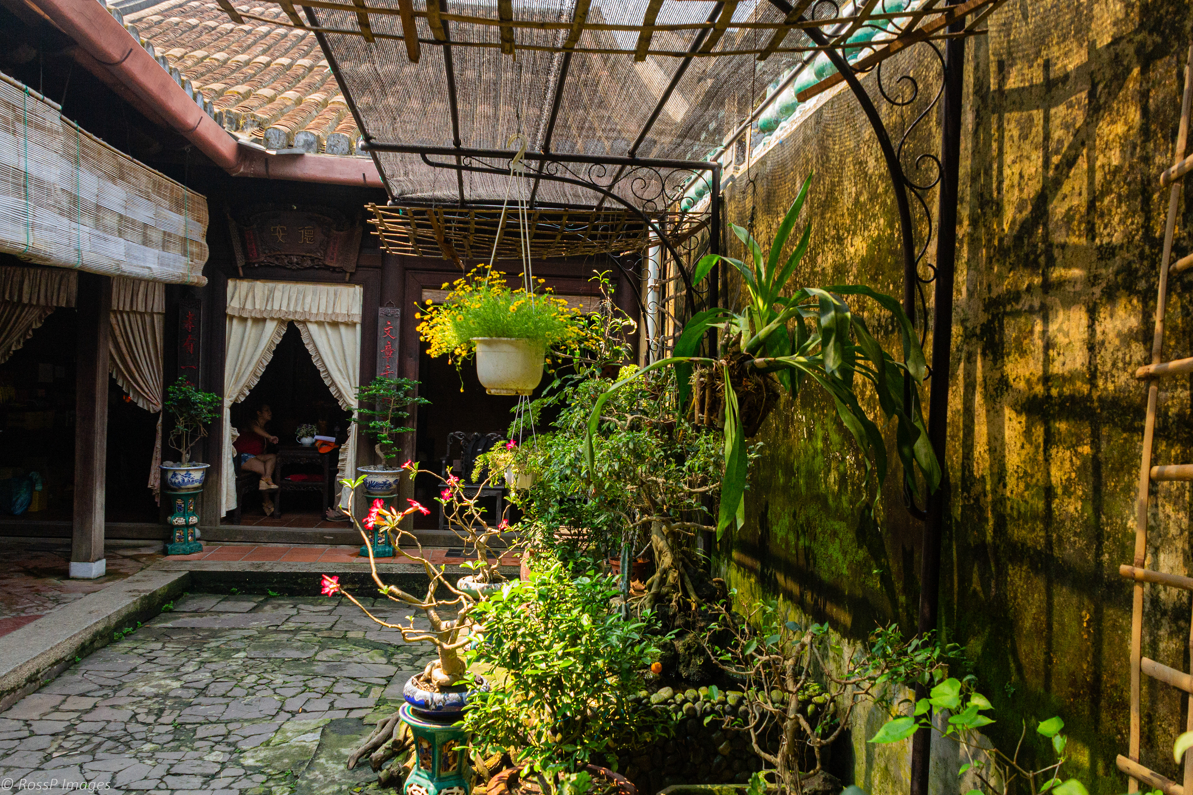 The central courtyard is typical of Vietnamese architectural style.