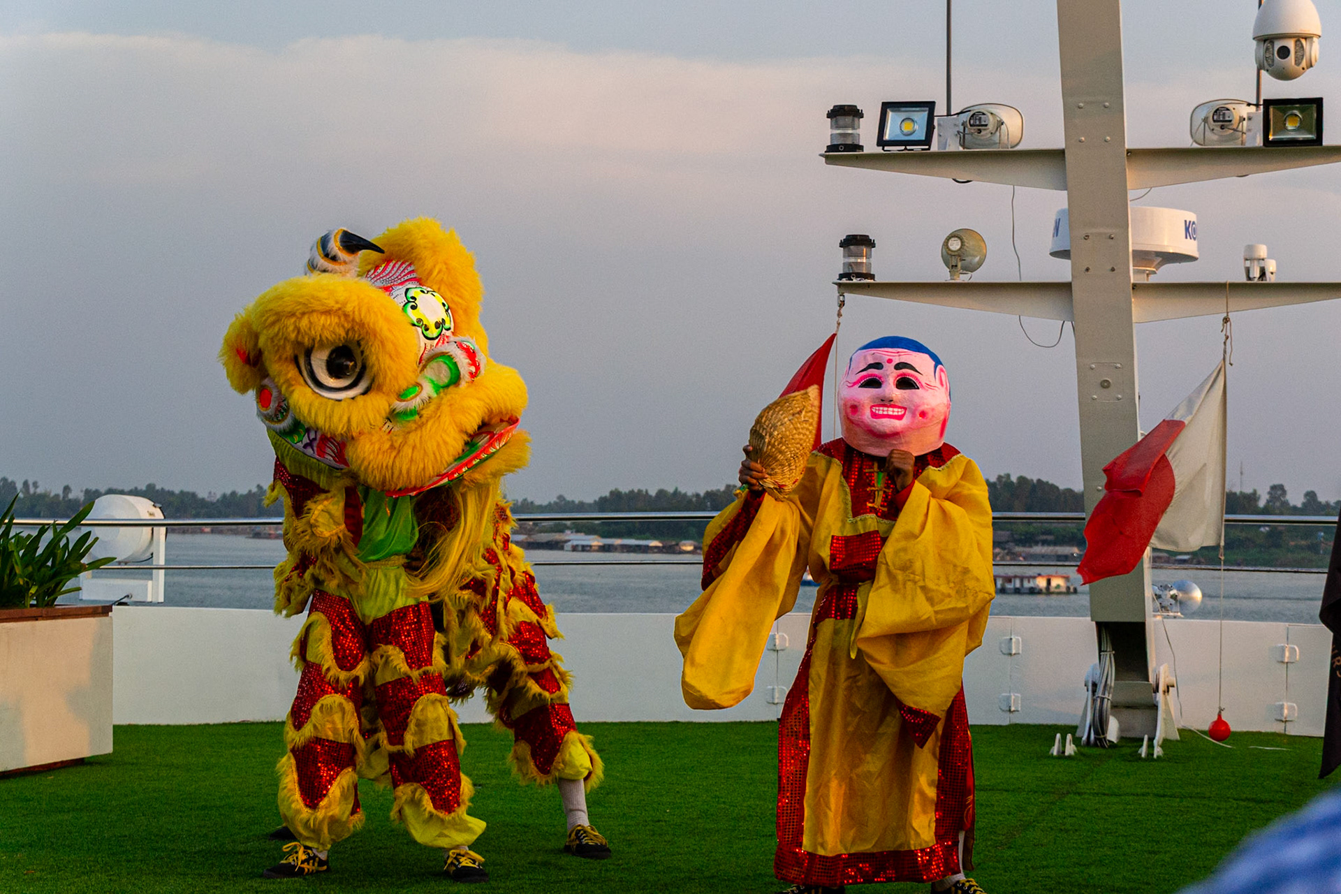 A local dance troup perform a Lion dance on board the Scenic Spirit as a final farewell to Vietnam..