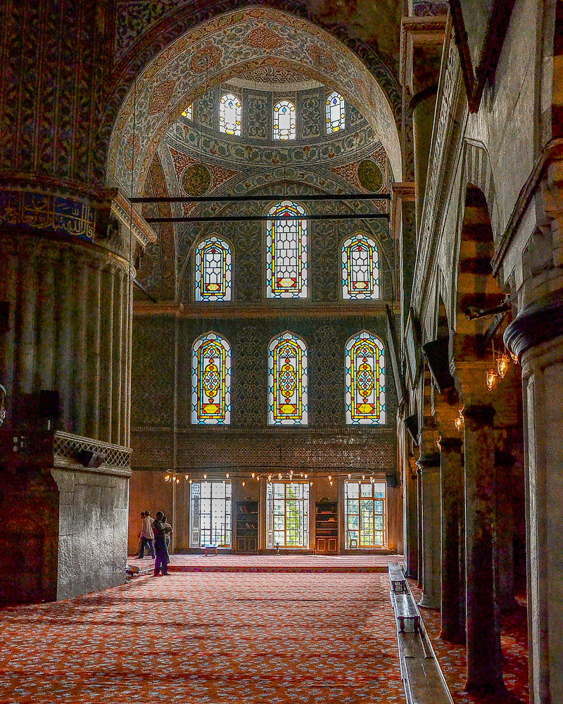 Hand-painted blue tiles adorn the mosque’s interior walls, hence its popular name.