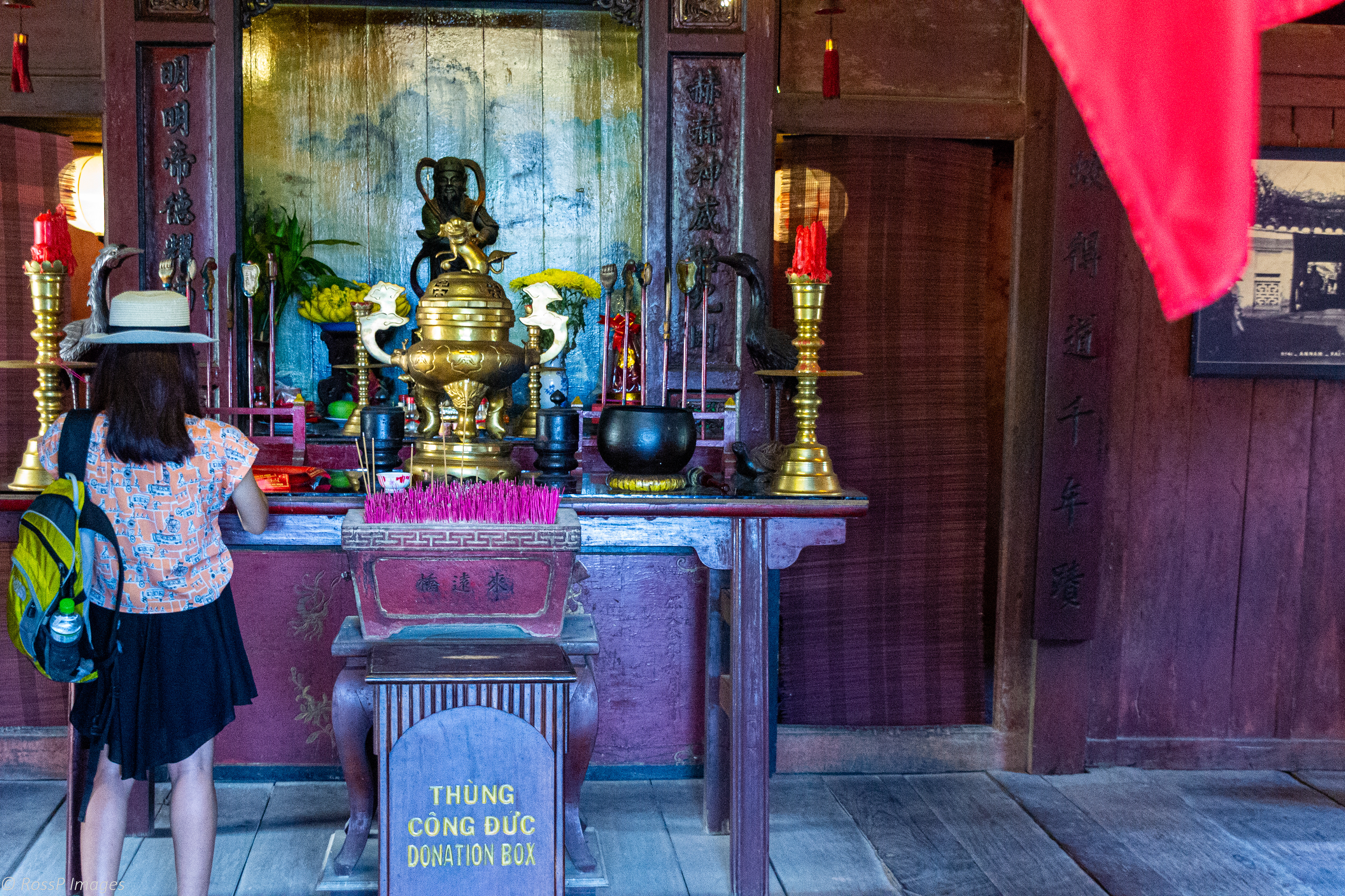 The Shrine inside the small Temple as you enter Chua Cau.