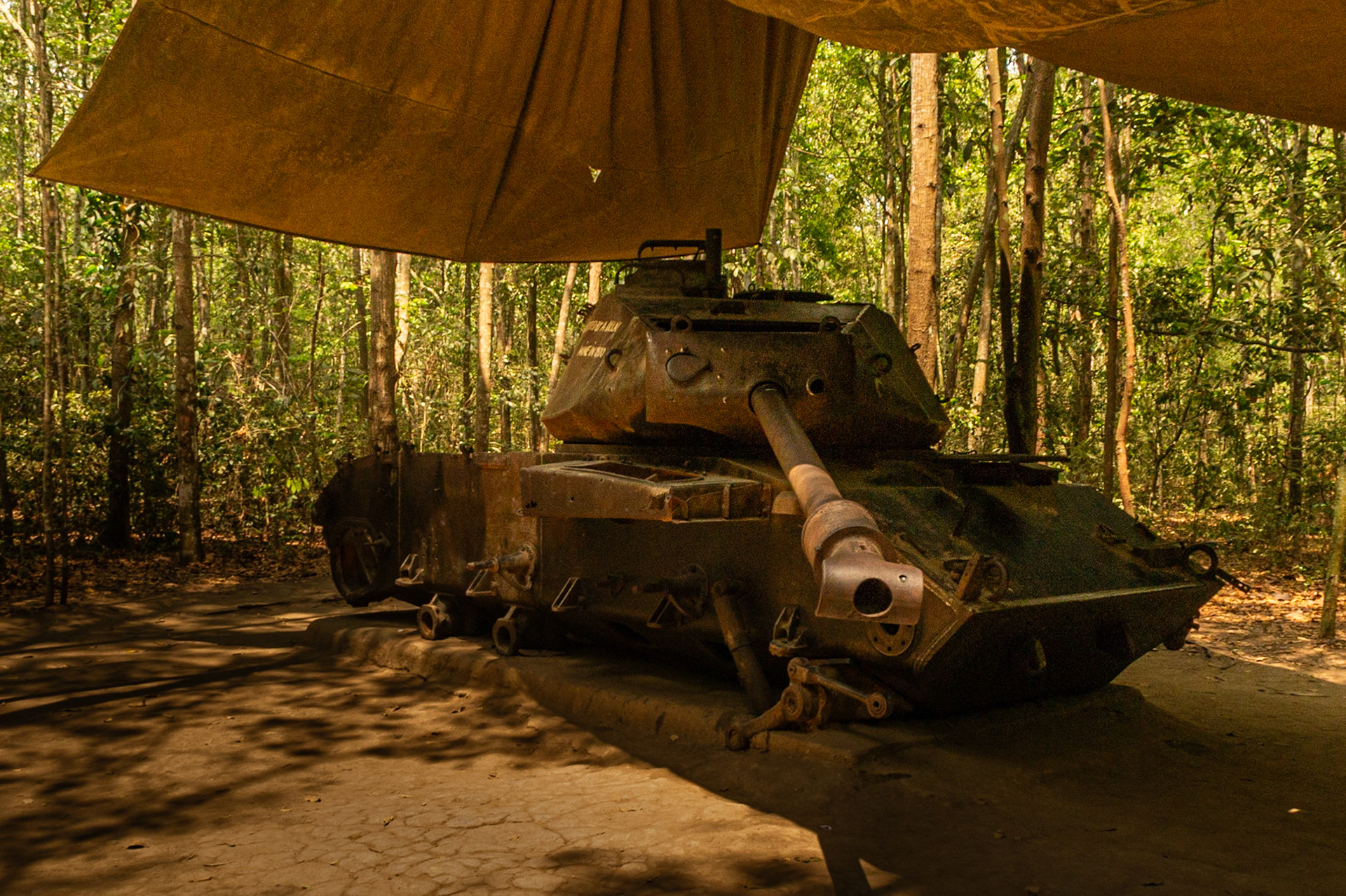 This US tank remains as a reminder of the war. The caption reads, "American M41 Tank was destroyed by a delay mine in 1970." This image was taken April 2016.