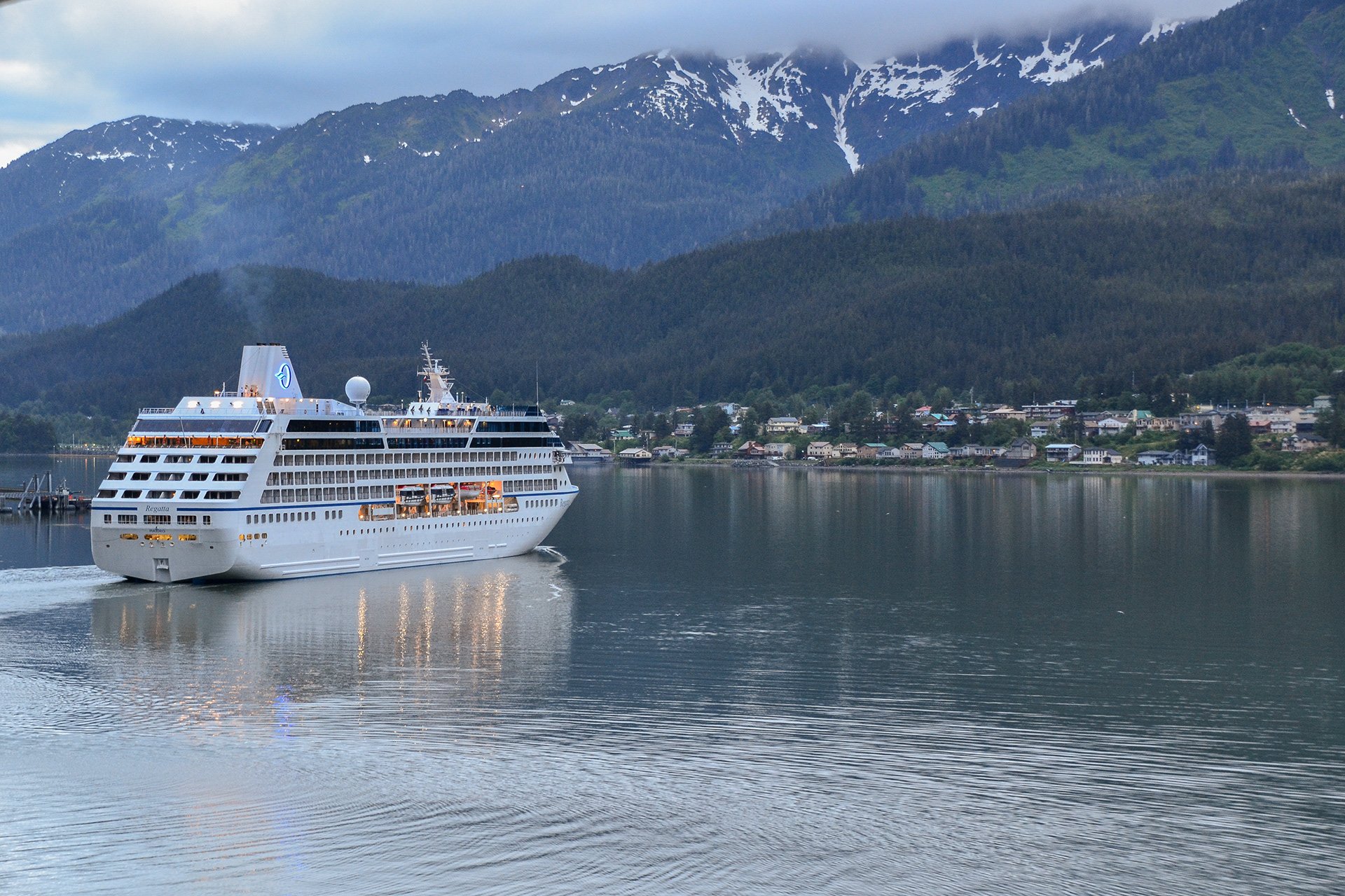 As one cruise ship departs another arrives, ........and the weather improves.