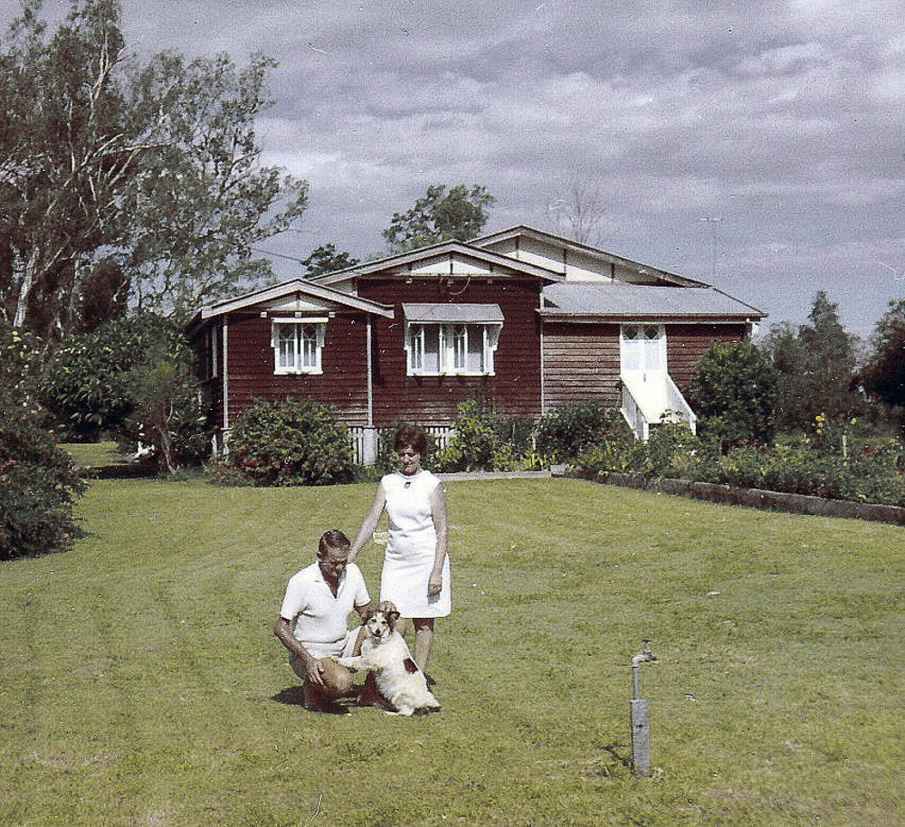 Ed and Nell with Bonnie in the front yard of their home at the Biloela farm, "le Nid".