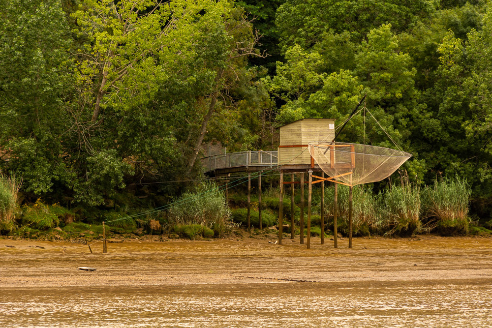 One of many Carrelets, wooden fishing huts built on stilts with their pulley operated nets.
