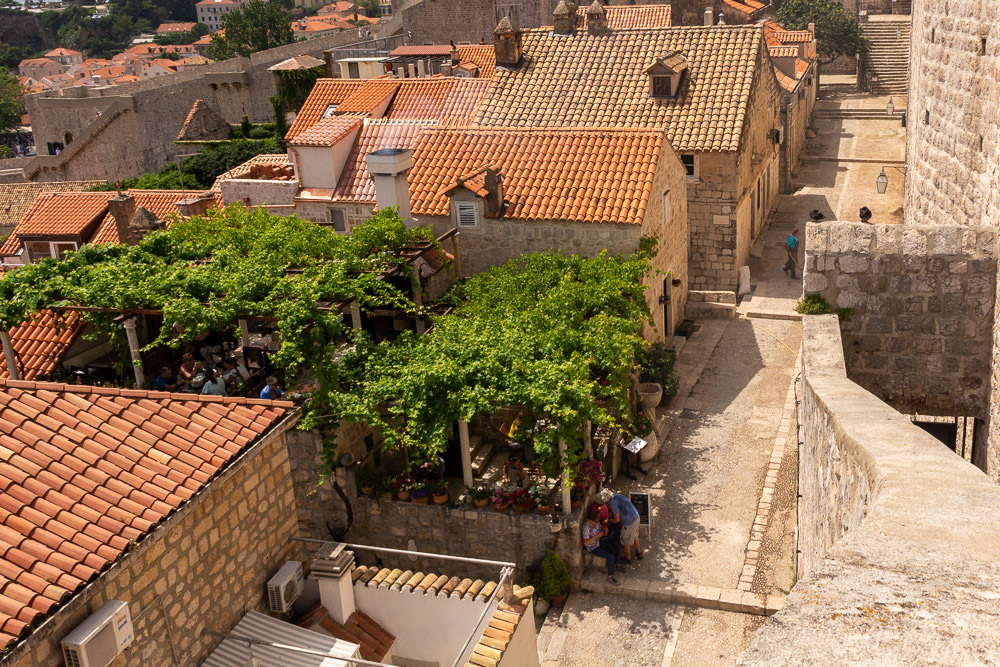 Grape vine covered pagolas provide a shady haven in the Old Town area consisting entirely of stone buildings and pavement.