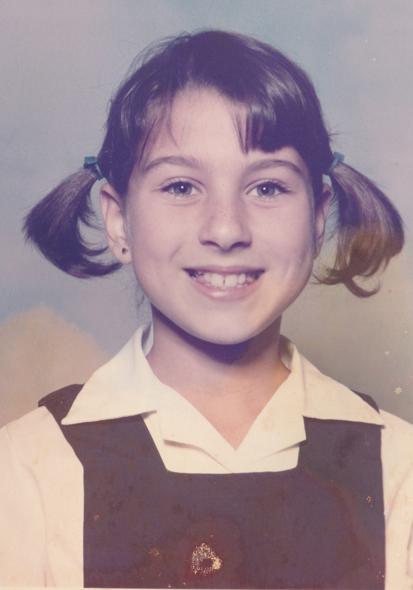 Tracy - School photo smile with all teeth.