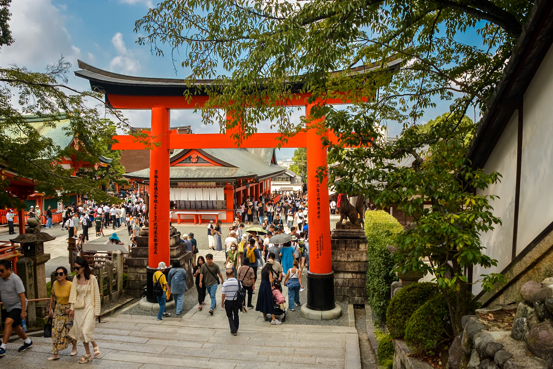 Fushimi Inari - a large Torii Gate frames the pathway leading back down into the main entrance courtyard of the Shrine.