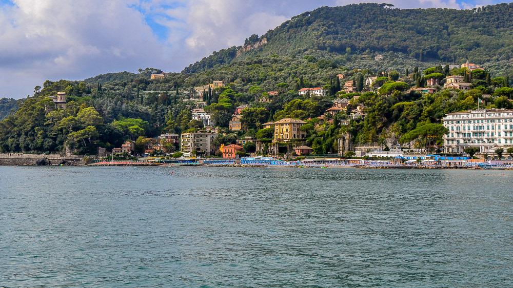 The view from our boat towards the village. Our hotel the five level villa on the left end fronting the esplanade.
