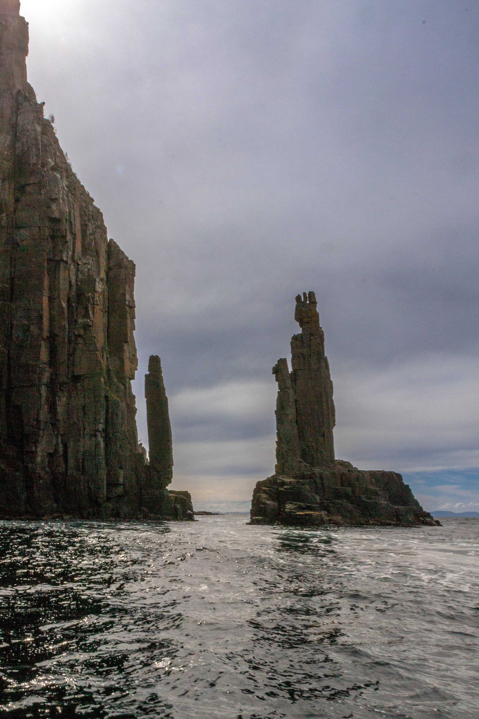 "The Monument", stands silhouetted against a threatening sky.