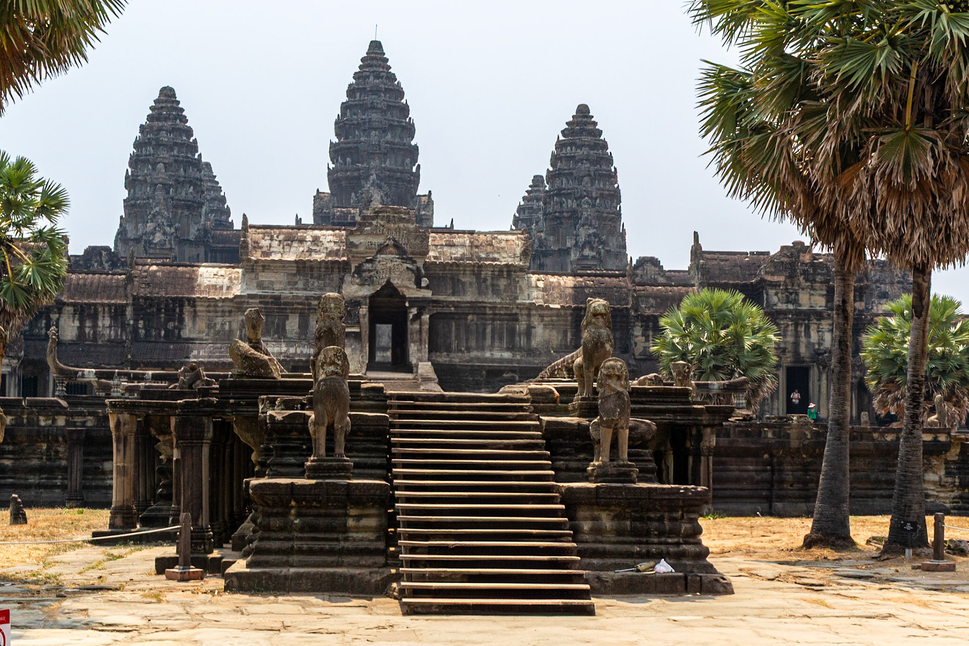 The Gopurams rise above the galleries as we enter Angkor Wat.