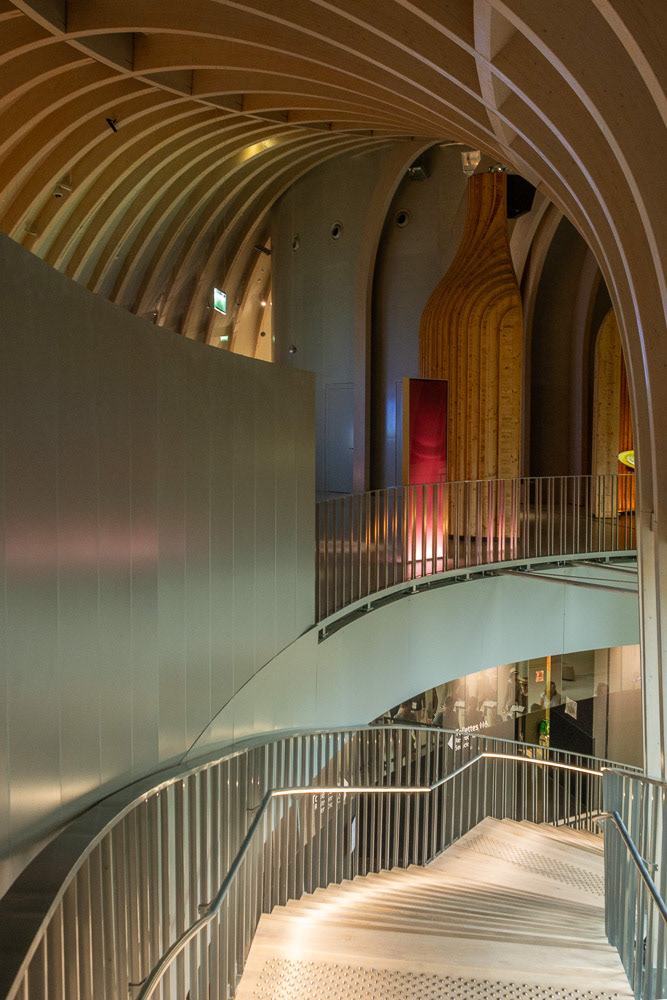 The interior of La Cite du Vin - an imperssive architectural structure.