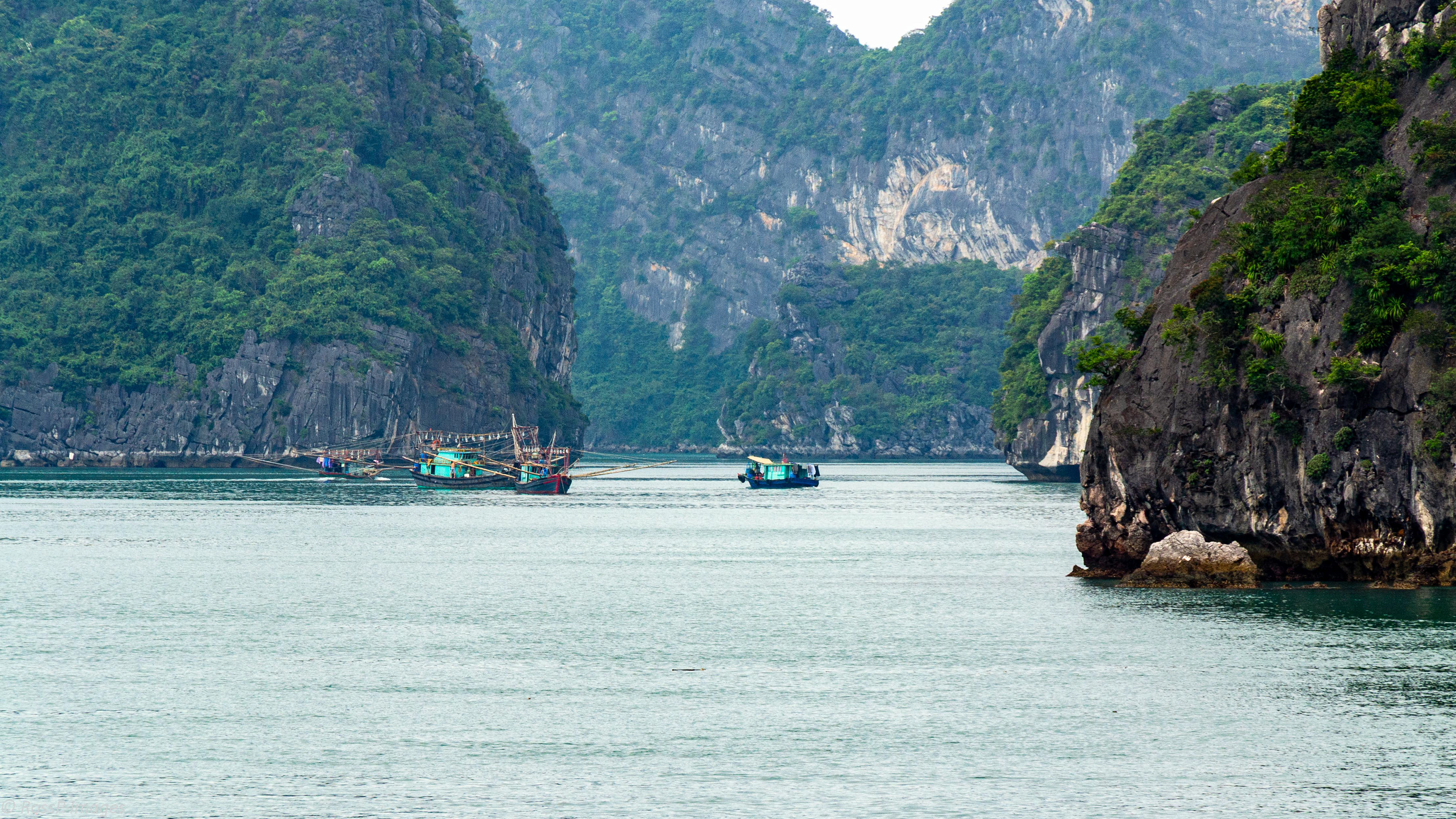 Numerous local fishing vessels are encountered along the way.