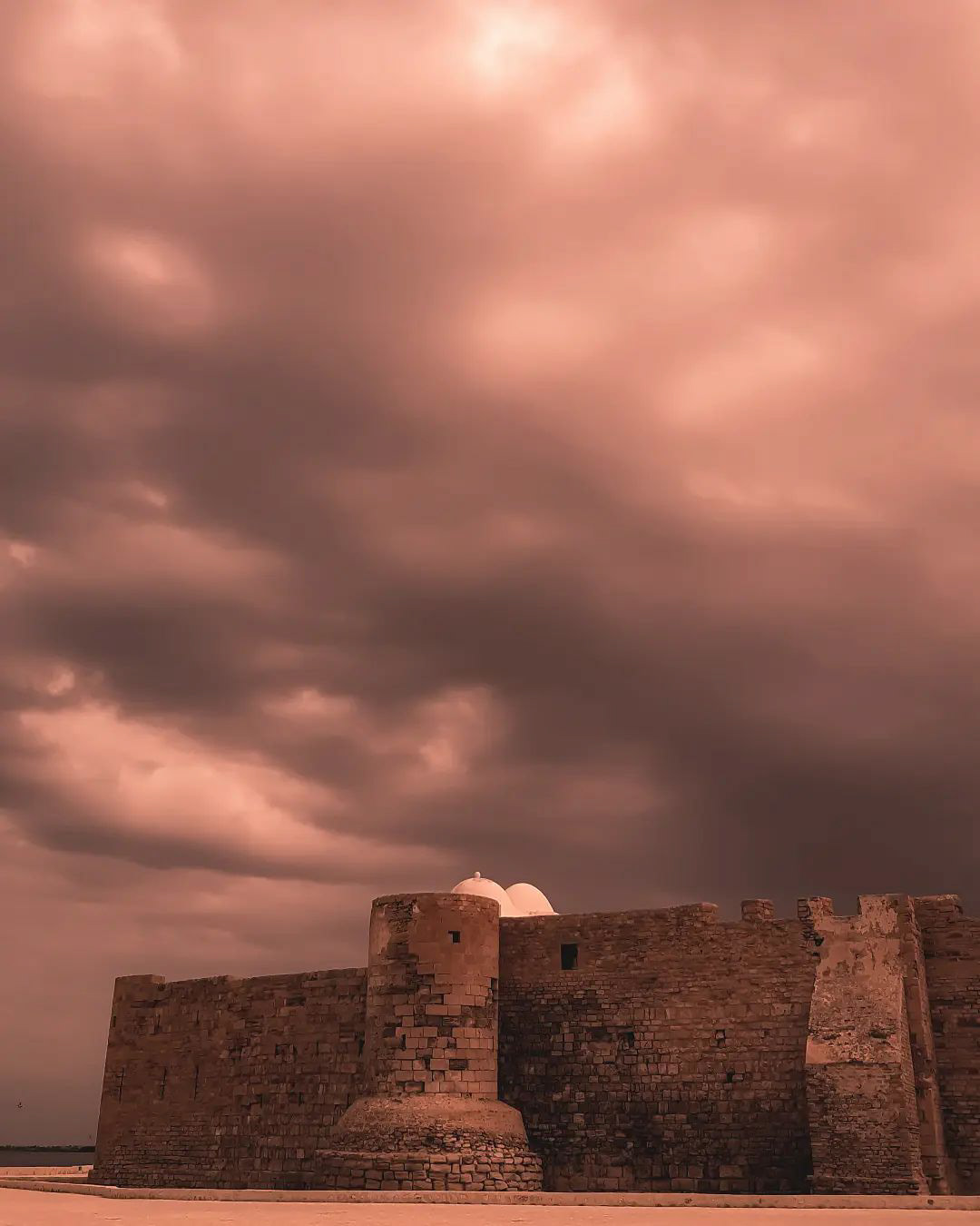 we stood in awe of this massive, ageless #fortress by a once turbulent #Mediterranean, guarding the #island for long centuries, here in #Djerba on #sunset, fairy #photography by Khaoula Aroua, from southern-eastern #Tunisia.. Peace!