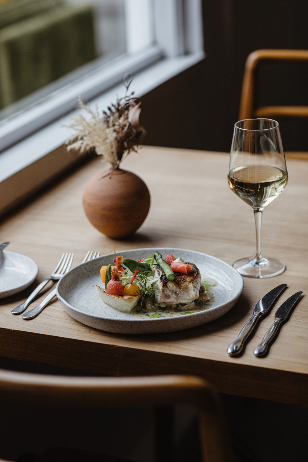 St Georges Restaurant's summer menu, the fish dish at a table setting