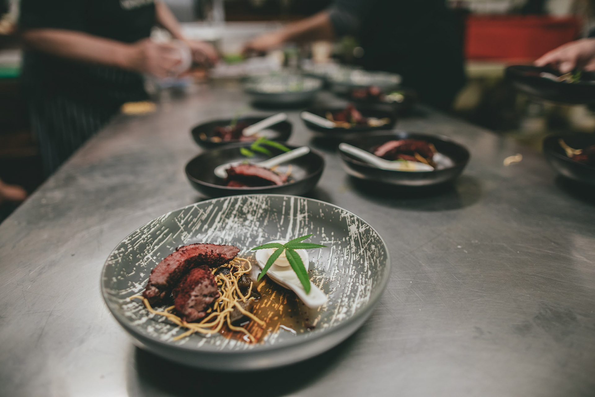 Tokyo Time event at Caution Restaurant - a course being plated up