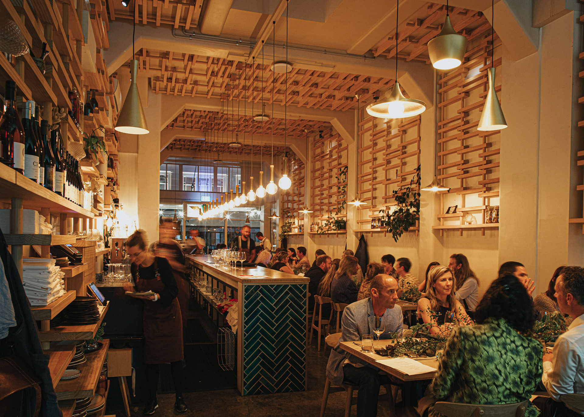 An interior view of Napier's Bistronomy Restaurant filled with patrons