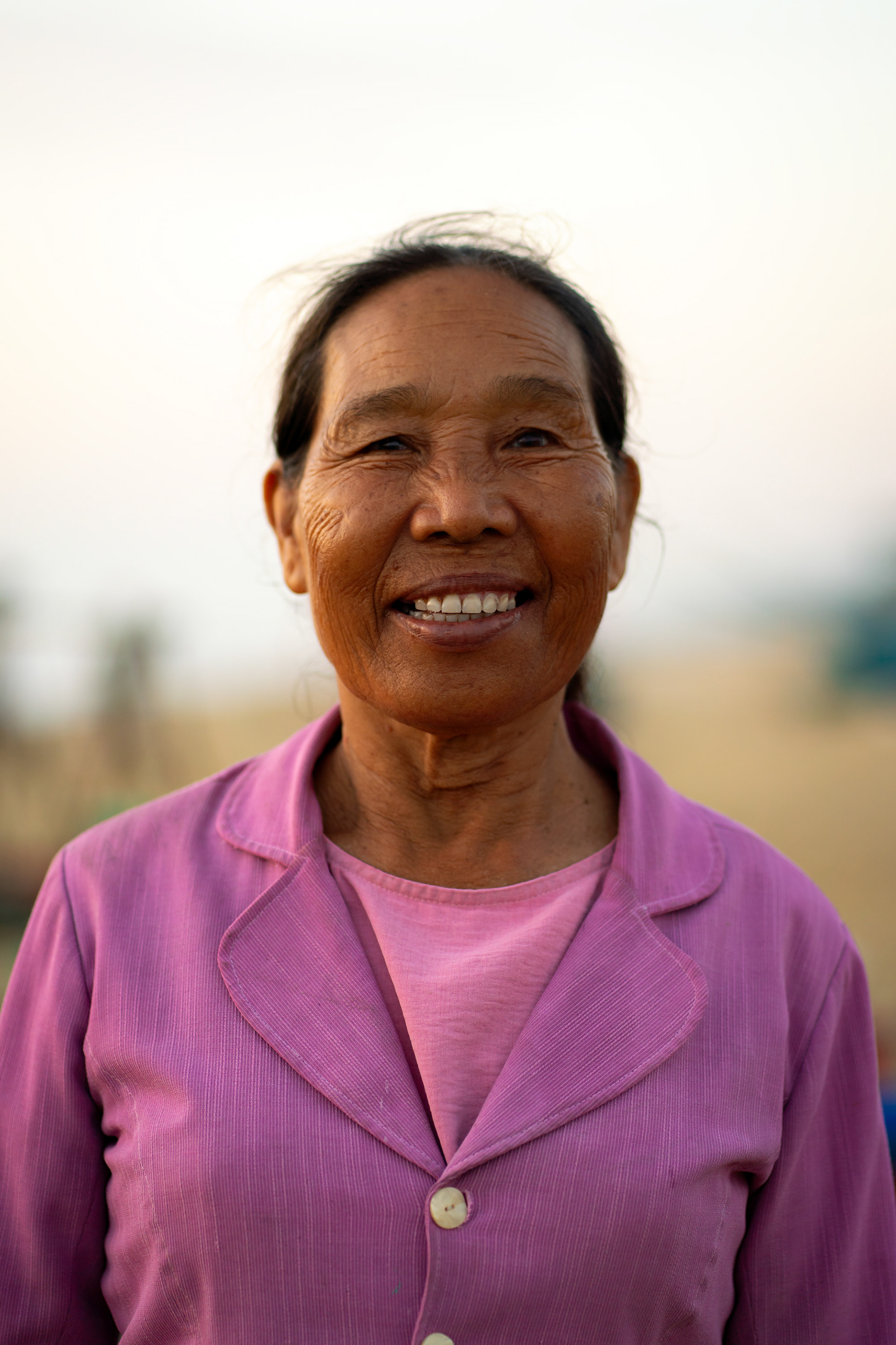 Portrait of a Vietnamese woman during the morning fish market near Hoi An.