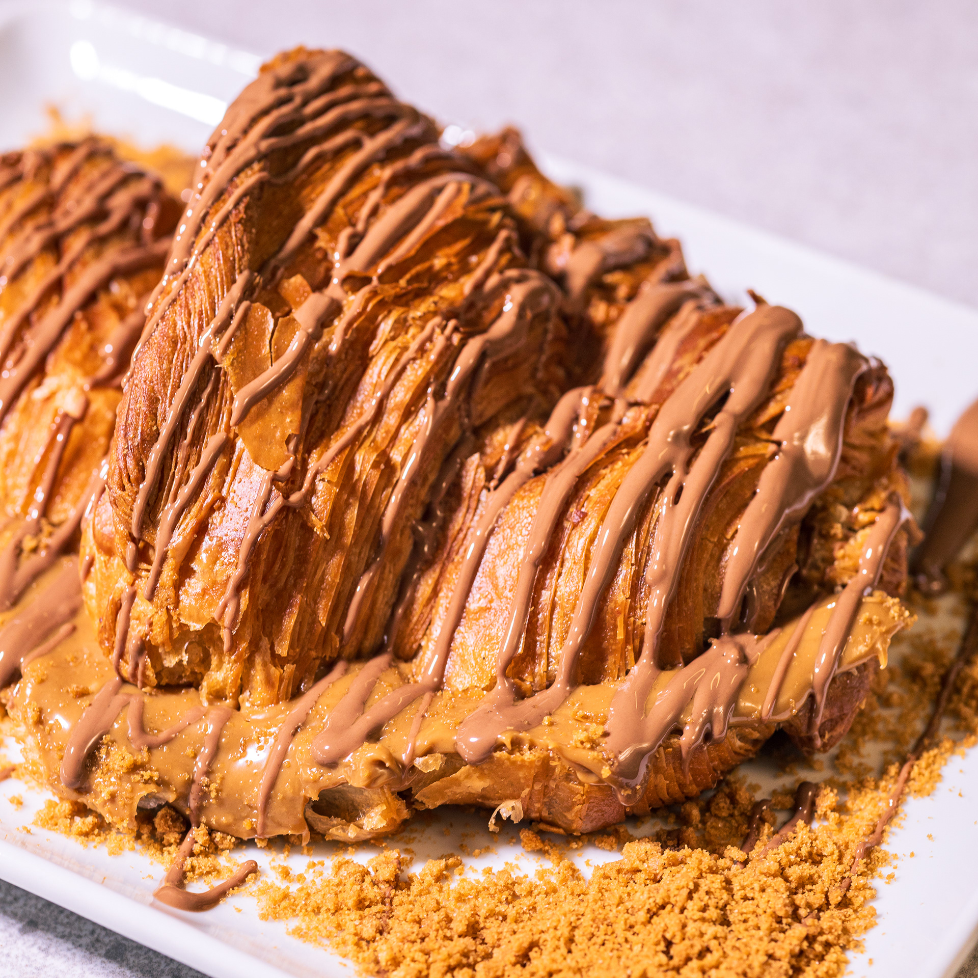 LOTUS CROISSANT All the Lotus goodness packed into and onto our delicious buttery croissant. Made to order just for you