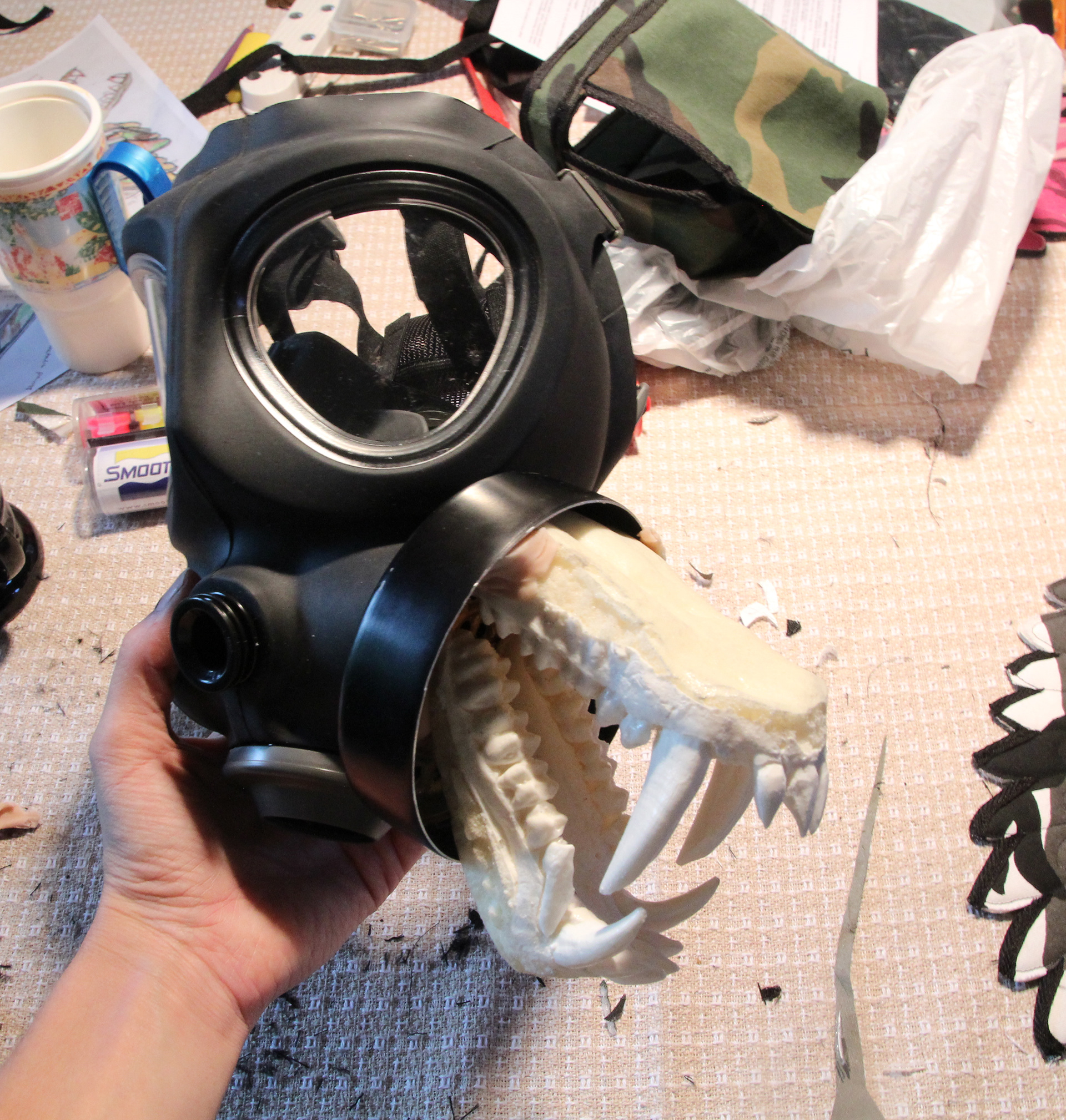 Baboon jaw casting- modified and placed inside of a hallowed out canister